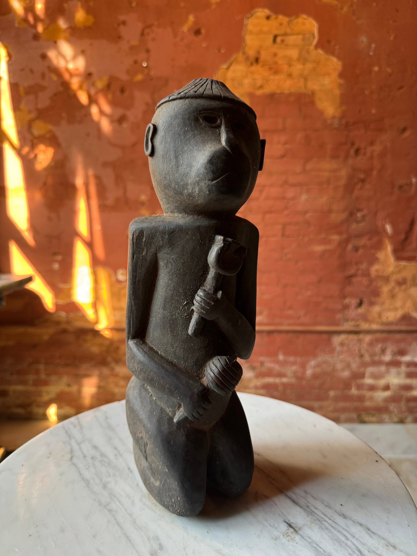 Antique African Sculpture of a Monkey: Well carved early 20th century African sculpture of a monkey.