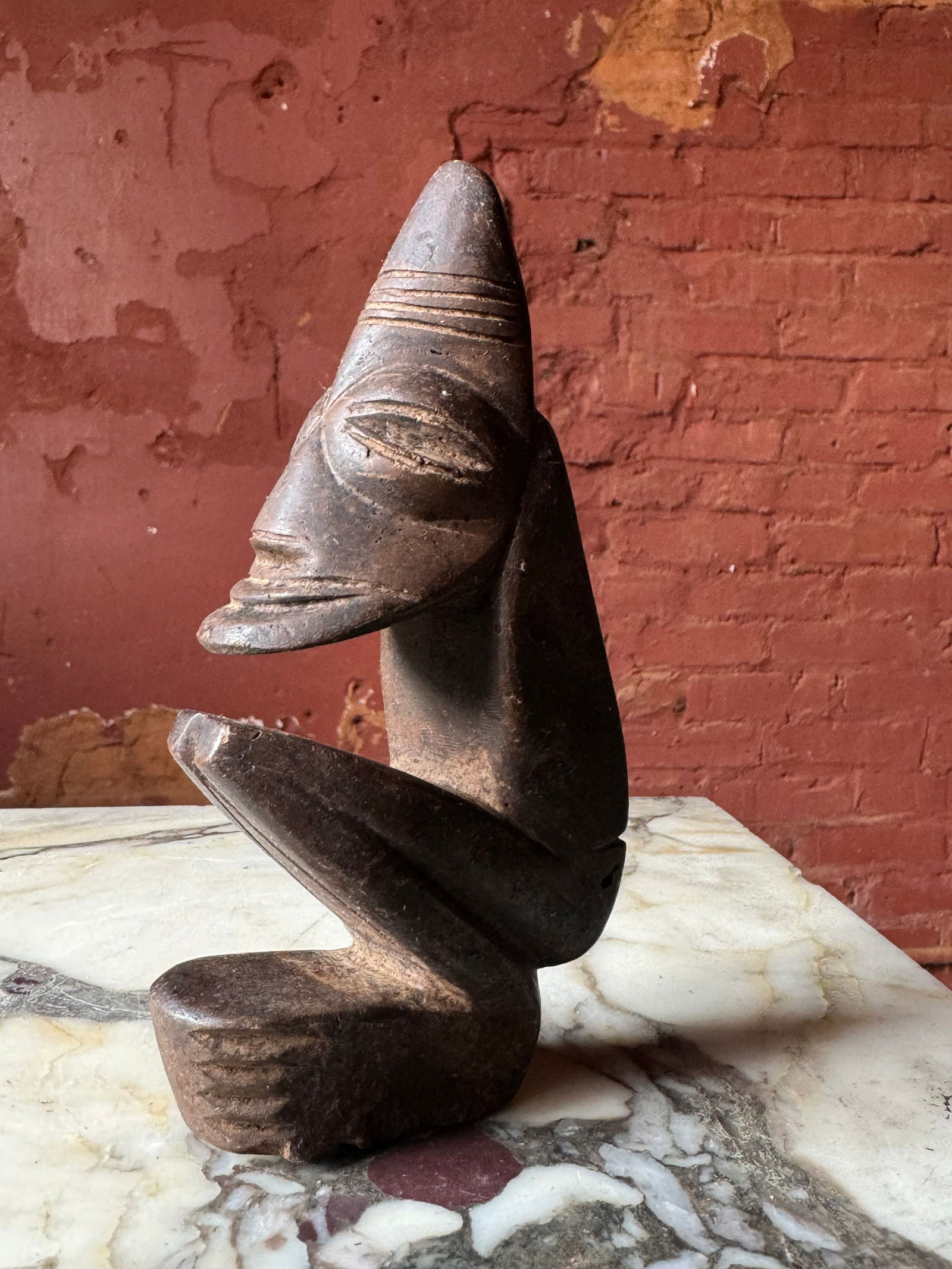 Antique stone effigy figure (1 of 5)