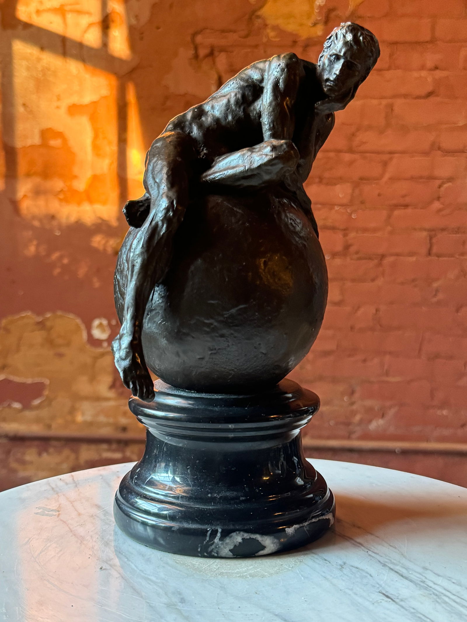 Pierre-Felix Fix-Masseau Sculpture male nude Art Deco: SUPERB FRENCH SCULPTURE BY OR AFTER Pierre-Felix Fix-Masseau" (French, 1869-1937) Bronze sculpture of a classical male nude Lounging atop a spherewith his chin in his hand in thought and contemplation