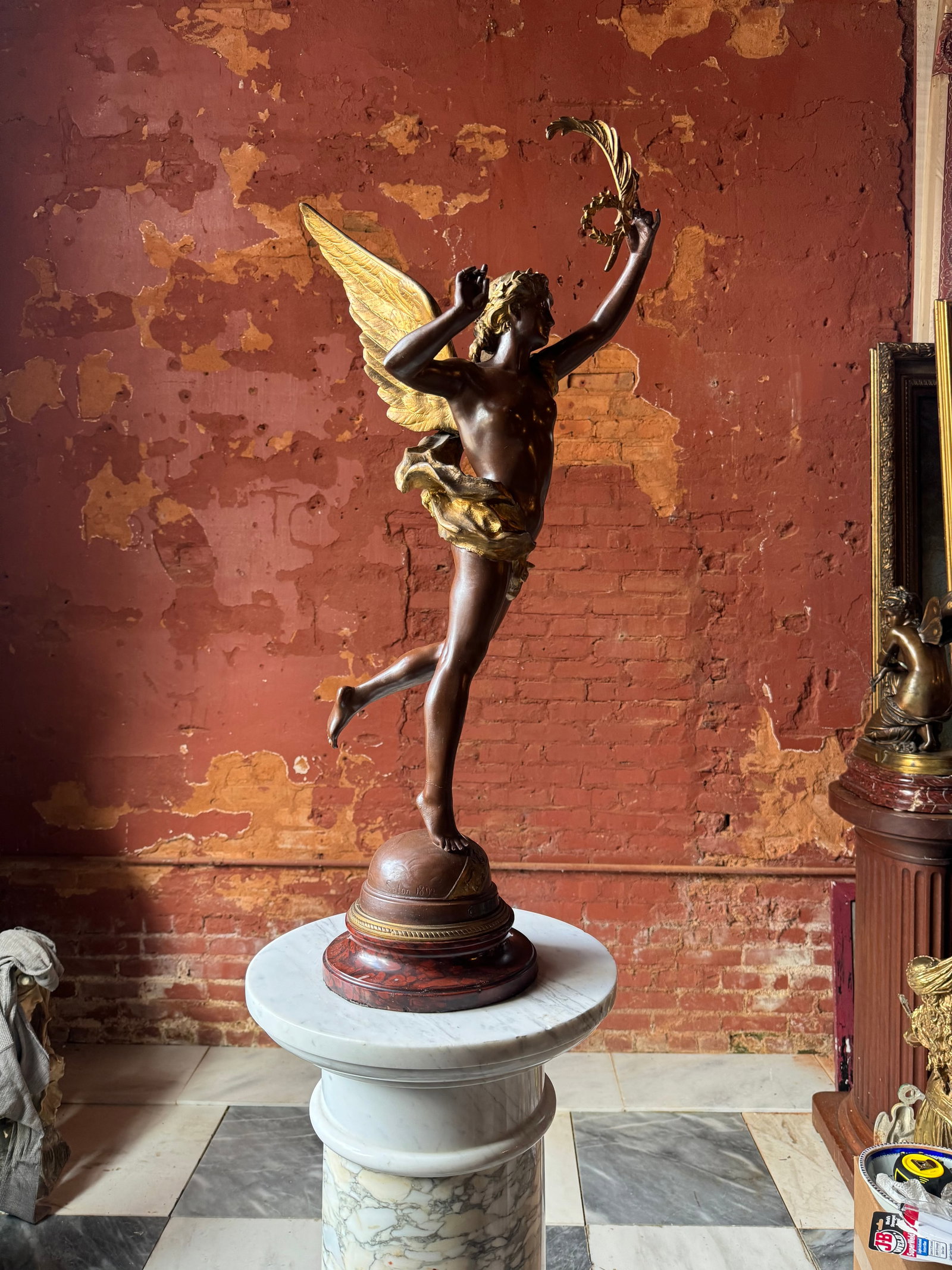 French Neoclassical Sculpture: Fine Art nouveau period French sculpture. This exquisite sculpture retains its original plate and rouge marble base.