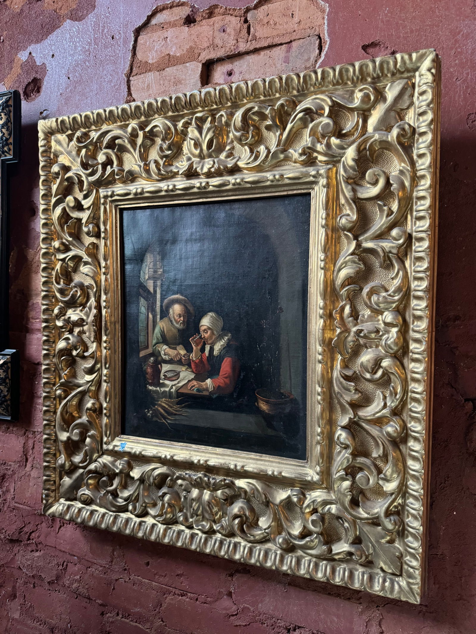 Fine Dutch Old Master Painting: Early Dutch Old Master painting. Oil on canvas retaining its original carved gilt baroque frame. Likely 18th centuryWith the frame, the work measures at approximately 23 1/2 inches wide by 26 1/4 high