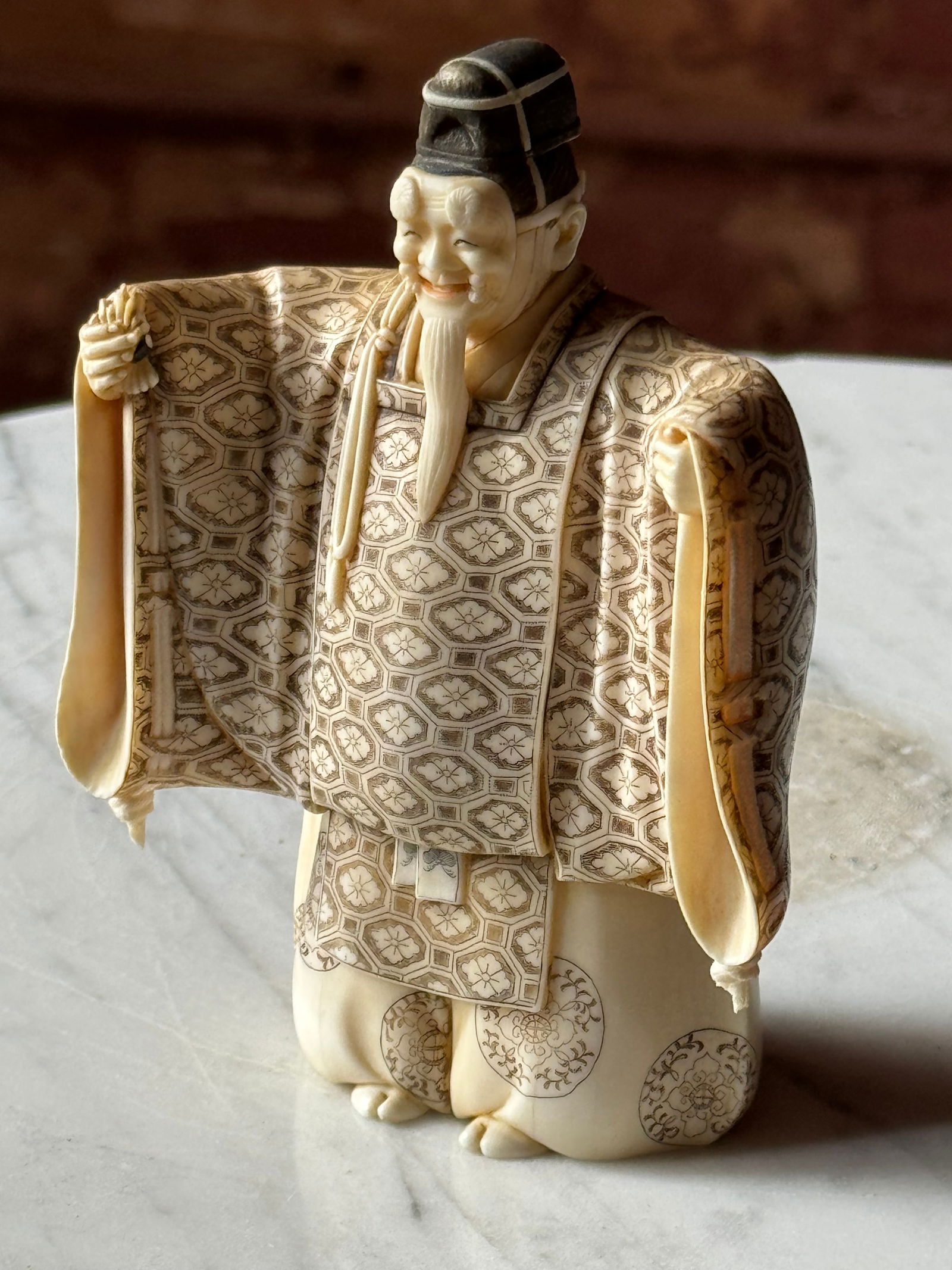 Fine Meiji Period Okimono Carved Figure 19th century: Very fine Japanese Okimono Carved figure. An exquisite example. Signed in a red lacquer plaque. Acquired in the 1920s or 30s from a prominent USN collection