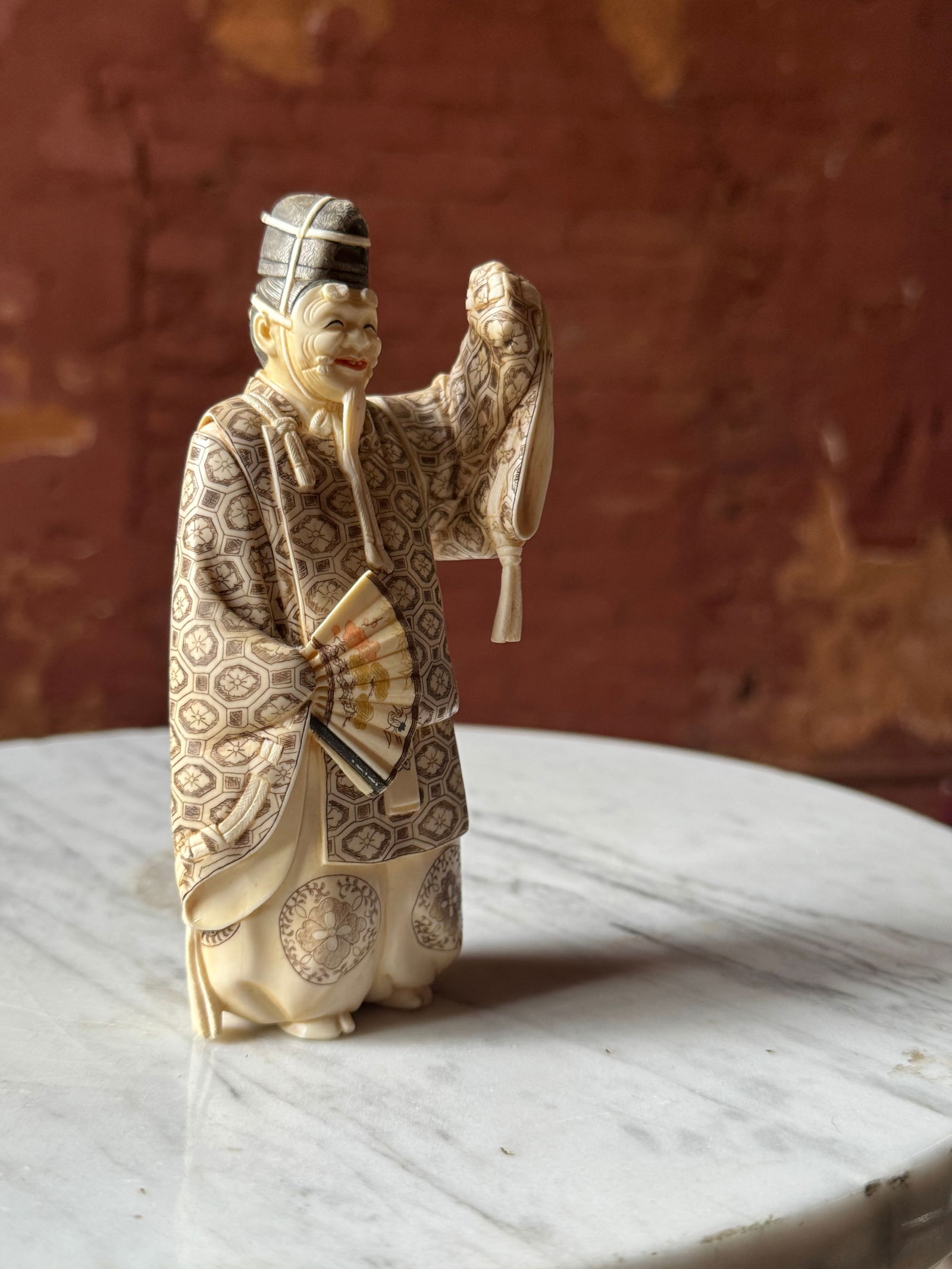 Fine Meiji Okimono Carved Figure Signed 19th century: Exquisitely carved Okimono figure. Dating from the 19th century. Signed underneath in a red lacquer plaque. Of the finest quality. From a prominent USN collection acquired in the 1920s or 30s