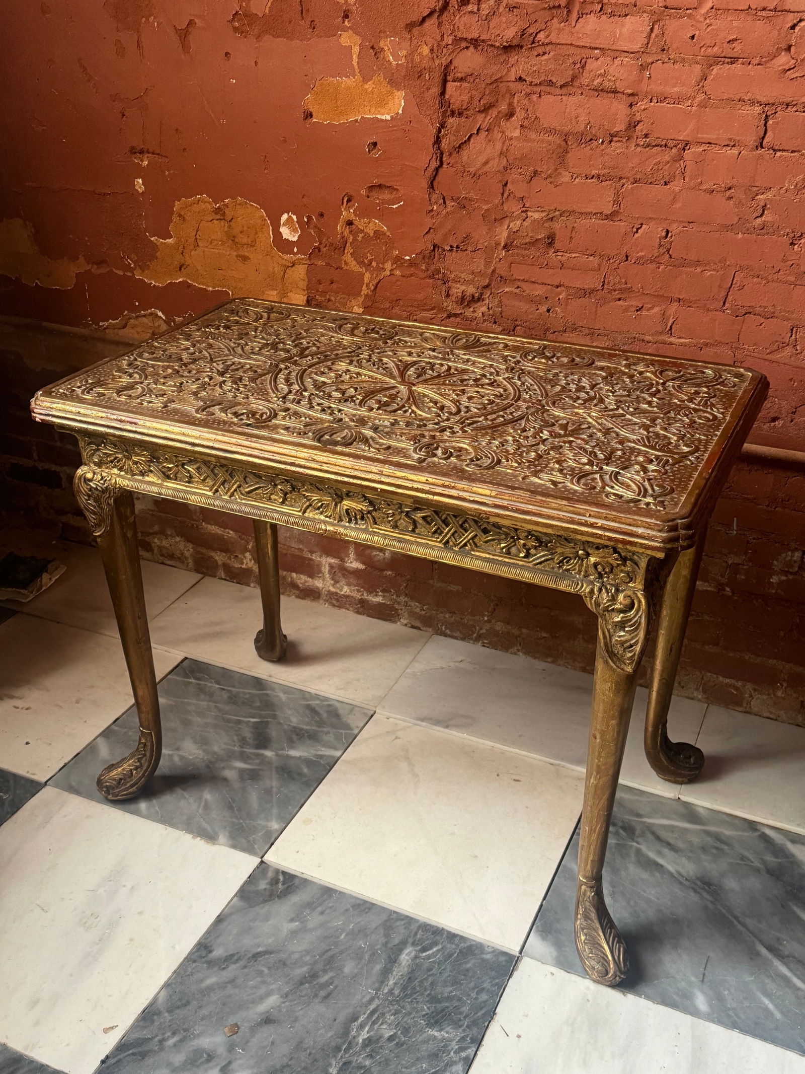 Antique Italian Gilt Wood Table baroque style: Fine gilt wood carved table. Italian in the baroque style. Finally carved and quite heavy. From a prominent Atlanta Estate.