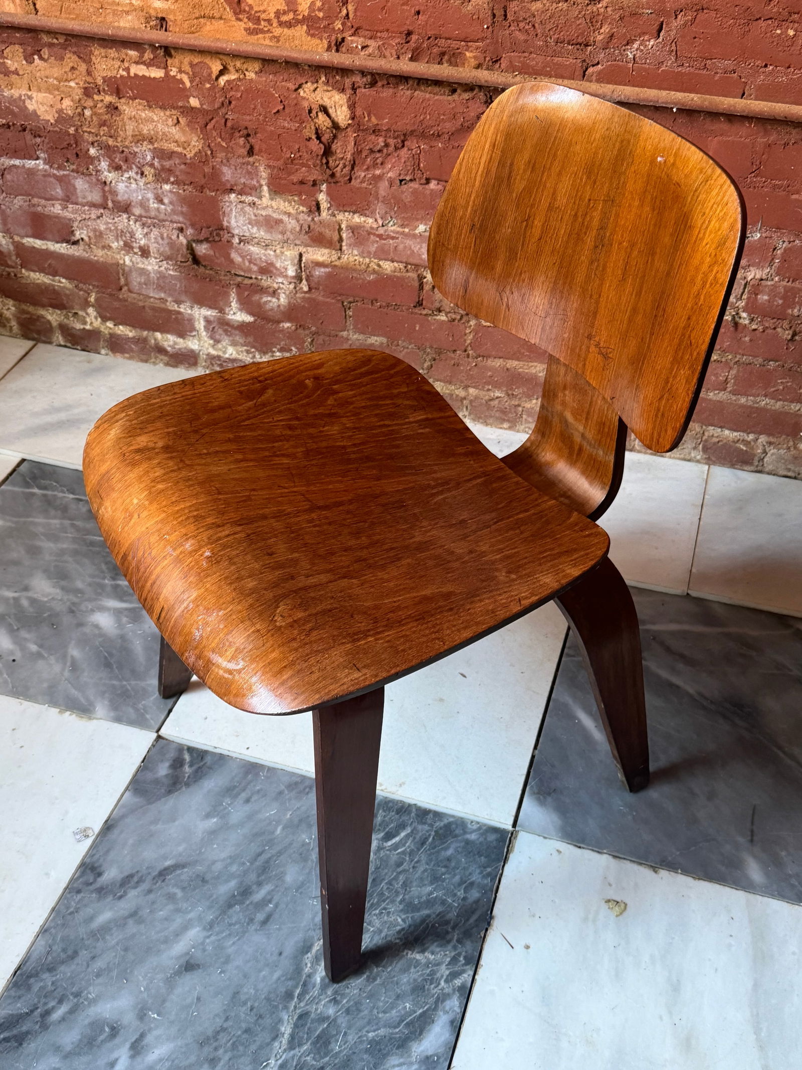 Eames Herman Miller DCW Chair Late 40’s: Rare Eames DCW with early bolt configuration. Original shock mounts. From a prominent NYC Estate. Dating to the 1940’s