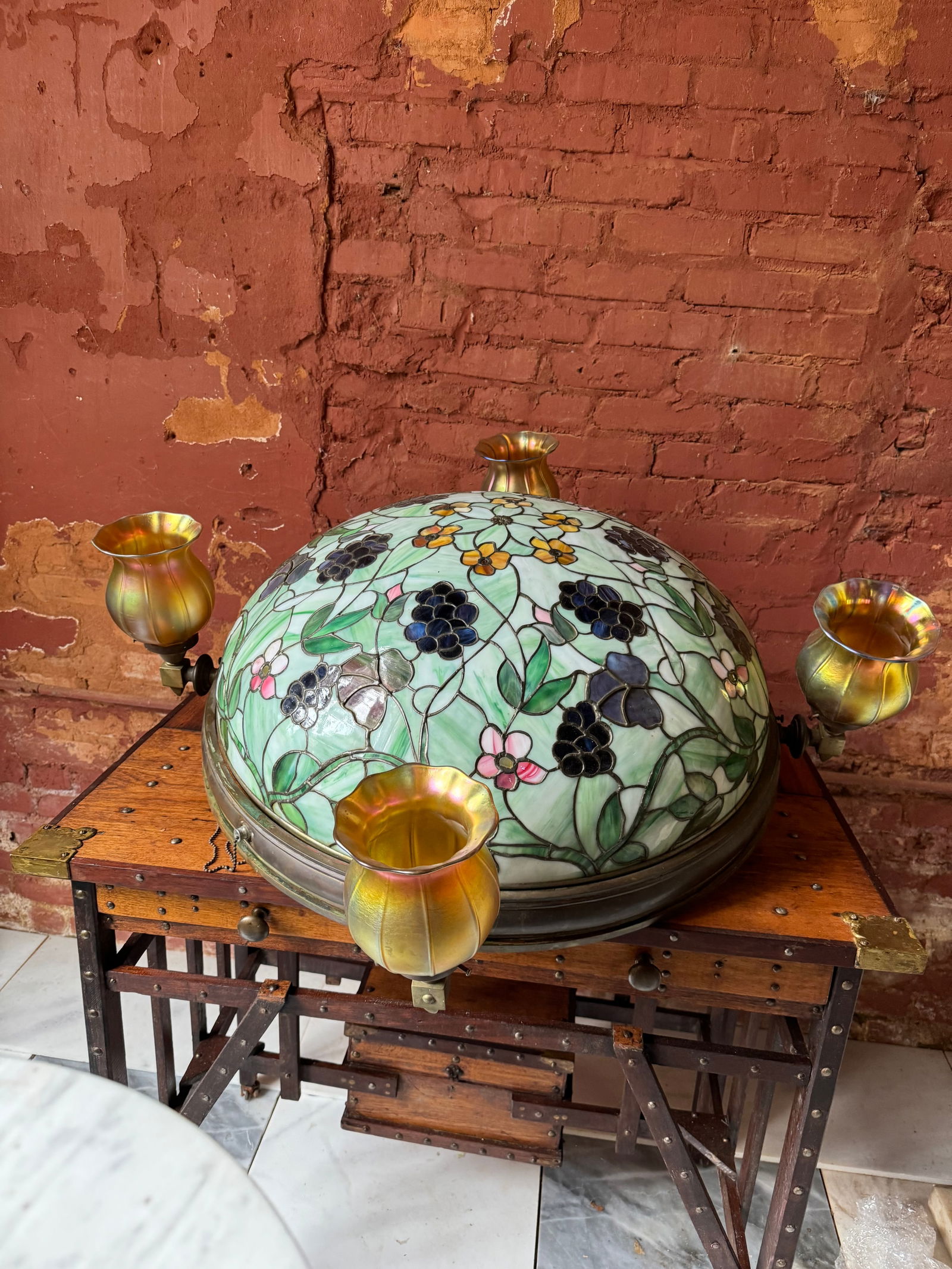 Antique Stained Glass Lamp John Morgan and sons Art Nouveau: Rare antique stained glass chandelier attributed to John Morgan and sons. Retaining original iridescent shades. Likely made by Steuben. A rare example. The dome measures at approximately 28 inches.