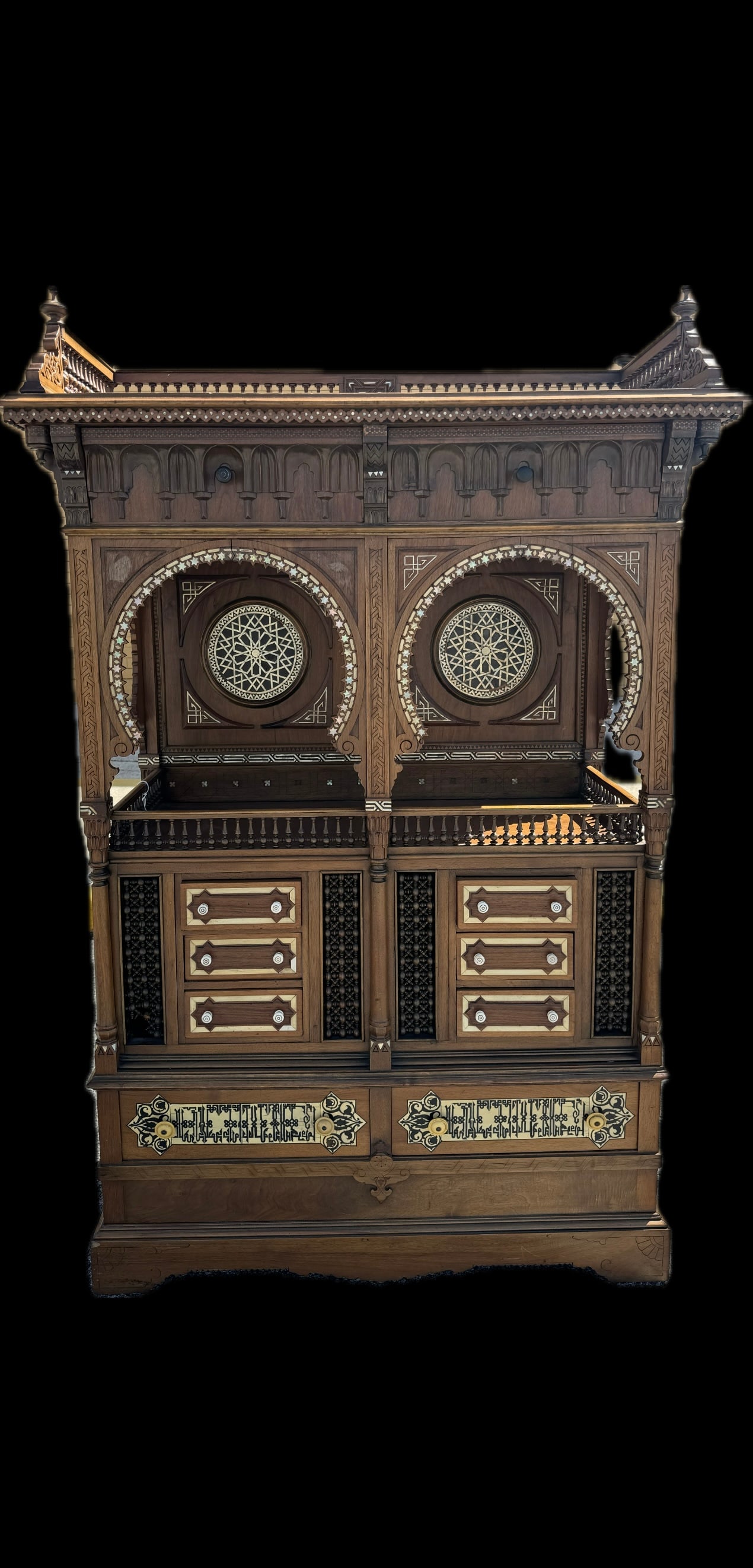 Orientalist Carlo Bugatti Cabinet: Fine 19th/early 20th century Orientalist cabinet possible by Carlo Bugatti. A masterfully executed example. Lavishly adorned with inlay of mother of pearl. Featuring plaques adorned with Kufic inscrip