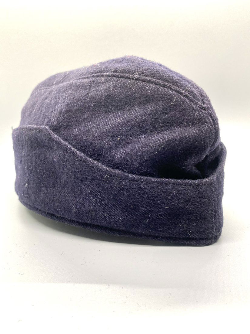 GERMAN FEUERSCHUTZPOLIZEI OVERSEAS CAP NAZI WWII: A rare fire brigade cap. Usually only the visor caps are offered here. Maker is neatly stated in the cap.