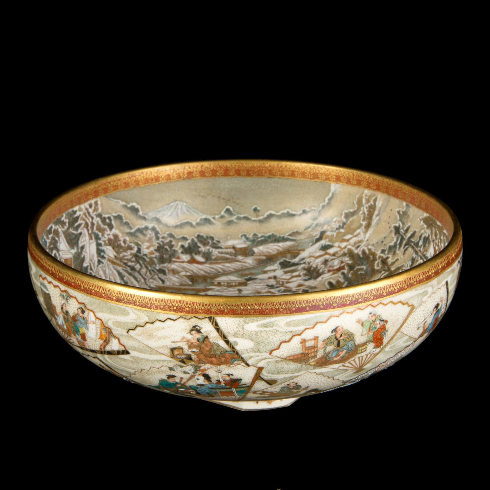 A SATSUMA BOWL: d. 16.5 cmSatsuma ceramic bowl entirely decorated with the representation of the Yushima Tenmangu ''Tenjin Shrine'' faithfully reproduced with decoration of characters and miniature details in a snow-