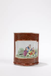 A FAMILLE ROSE PORCELAIN BRUSH POT, China, Republic Period (1912-1949): Poly-lobed in shape with a rust background and reserves containing children playing; bears the apocryphal mark of the Jiaqing Emperor. 粉彩陶瓷笔ç’,ä¸&