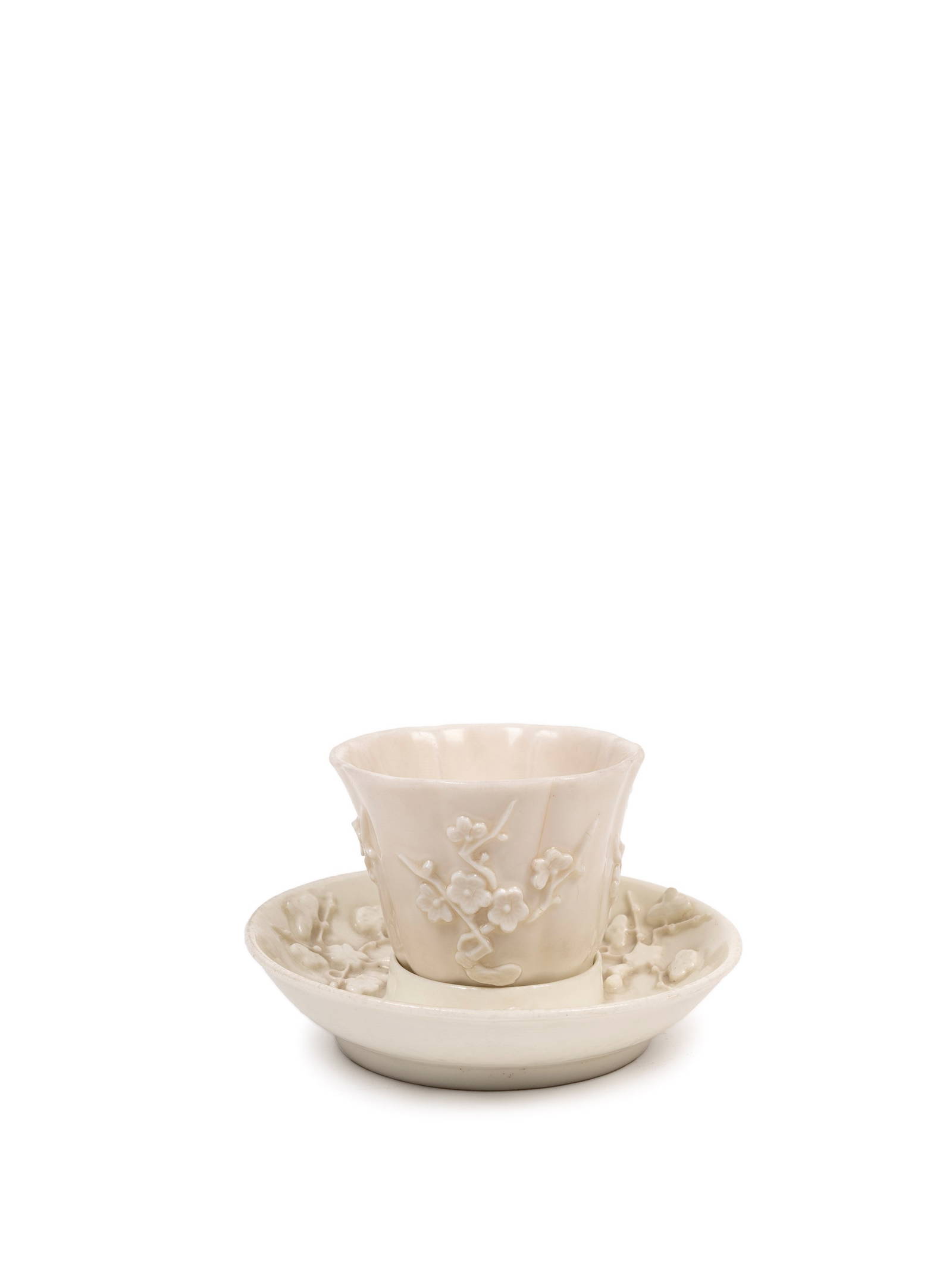 A DEHIA PORCELAIN CUP WITH SAUCER, China, Qing dynasty, 18th century