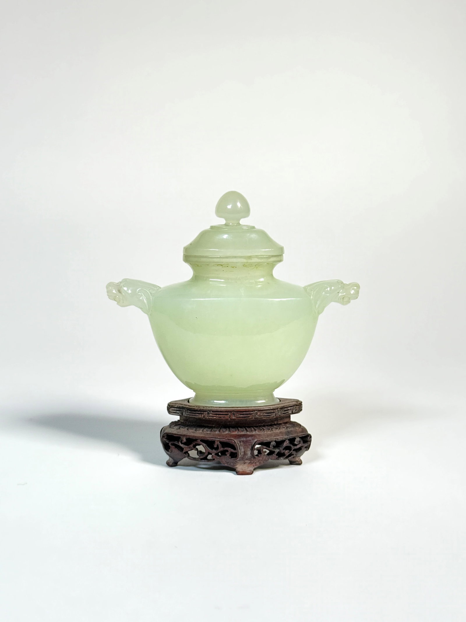 A SMALL SERPENTINE JADE VASE WITH COVER, China, 20th century (1 of 1)