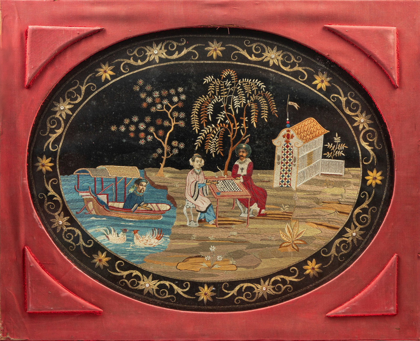 AN EMBROIDERED SILK, China, Qing dynasty, late 19th century: h tot. cm 60,5 x l tot. cm 74,5 Oval in shape, finely brocaded along the brim with floral motifs; the central scene features a female figure playing with a dignitary amidst a landscape of trees, rocks