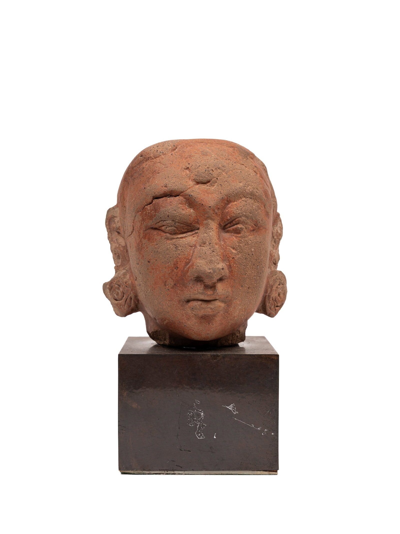 AN ANTIQUE INDIAN TERRACOTTA HEAD,: h cm 14