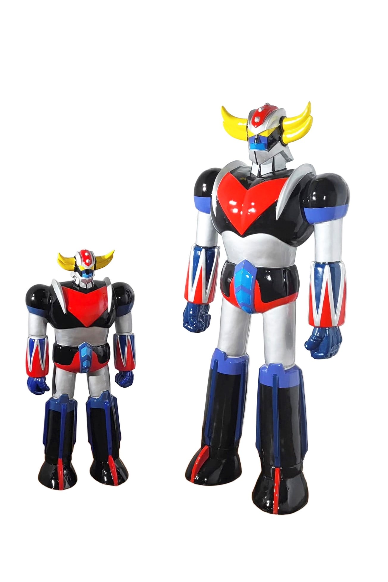 A PAIR OF GOLDRAKE FIGURE STATUES, (1 of 1)