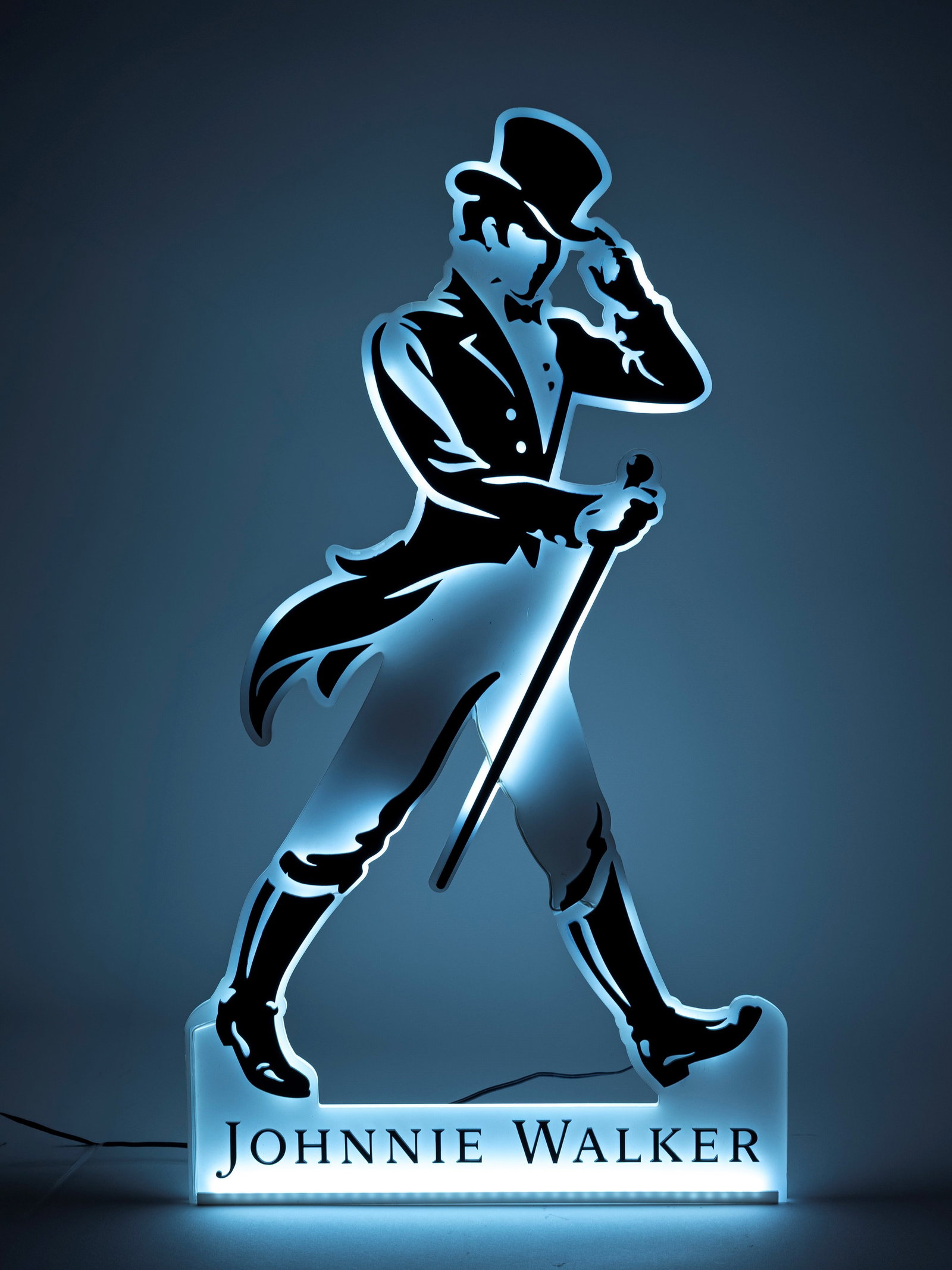 A JOHNNIE WALKER WHISKY LIGHTED ADVERTISING SIGN, : l cm 70 x h cm 40 Made of plexiglass.