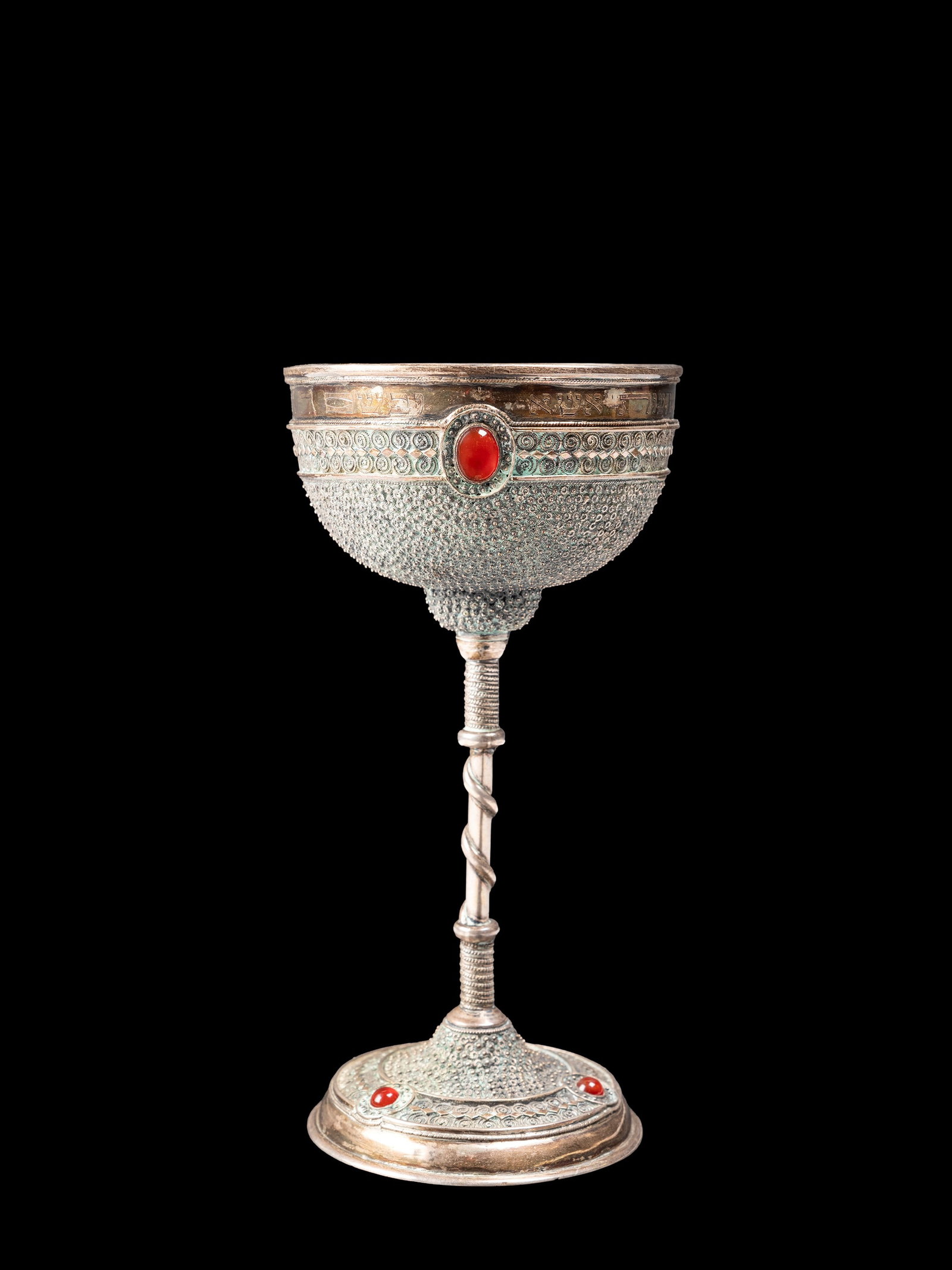 A JEWISH SILVER AND CARNELIAN GOBLET, Early 19th century: h cm 17.Weight 240 g.