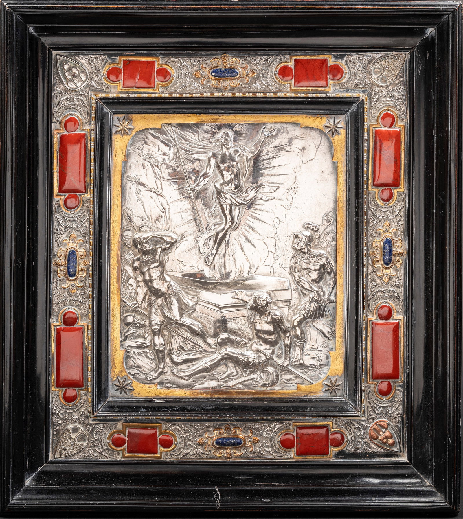 SILVER-FINISHED FRAME WITH HARD-STONES, Rome, 17th century: Including frame: h cm 50 x l cm 44.It depicts a silver plaque depicting the Resurrection of Christ, set within a finely engraved and embossed silver and copper frame, accented with set semi-precious s