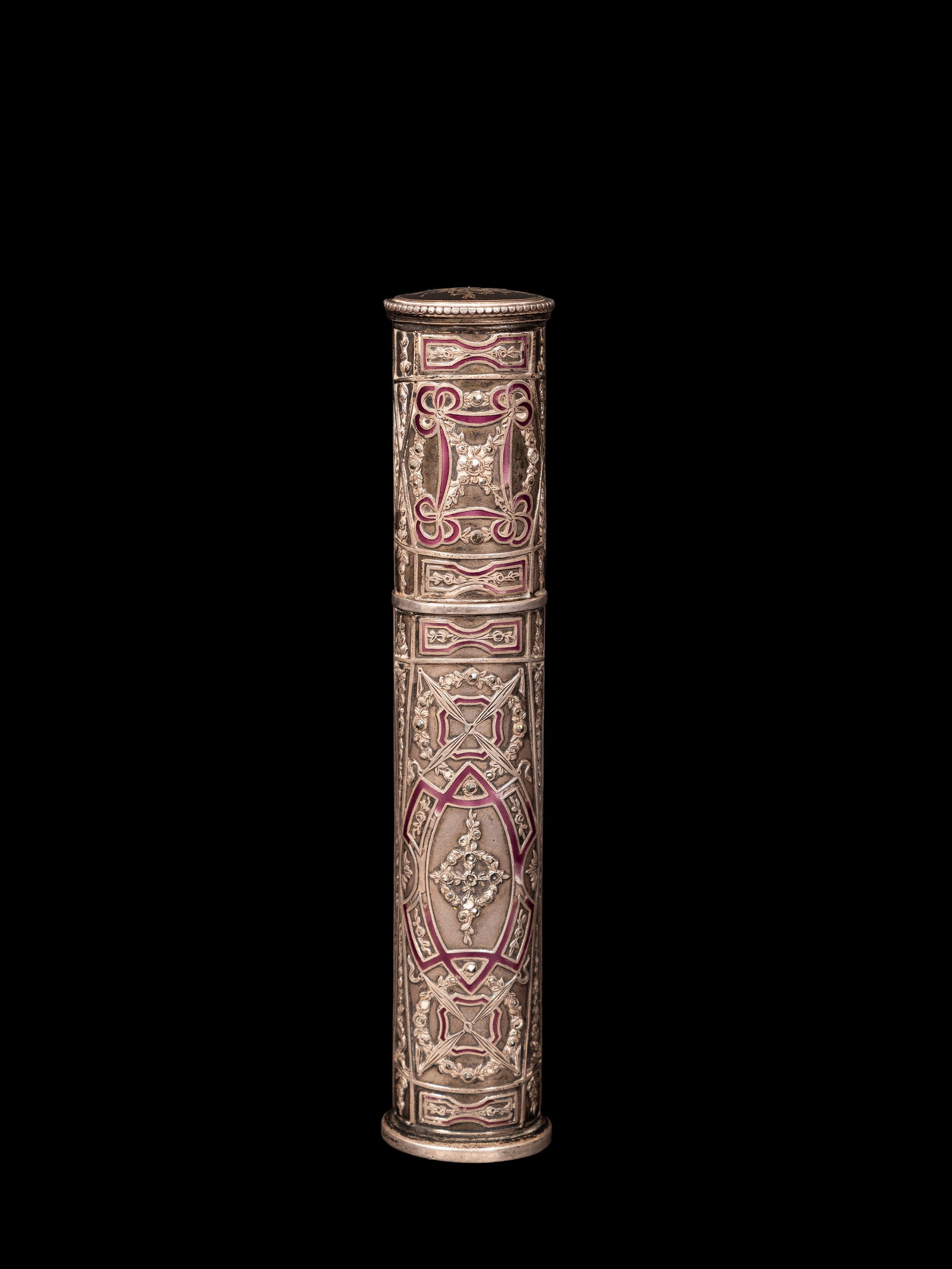 ENAMELLED SILVER CASE, France, 19th century: h cm 13,7.Engraved and chiselled, with floral and geometric decorations. Weight: 107 g.