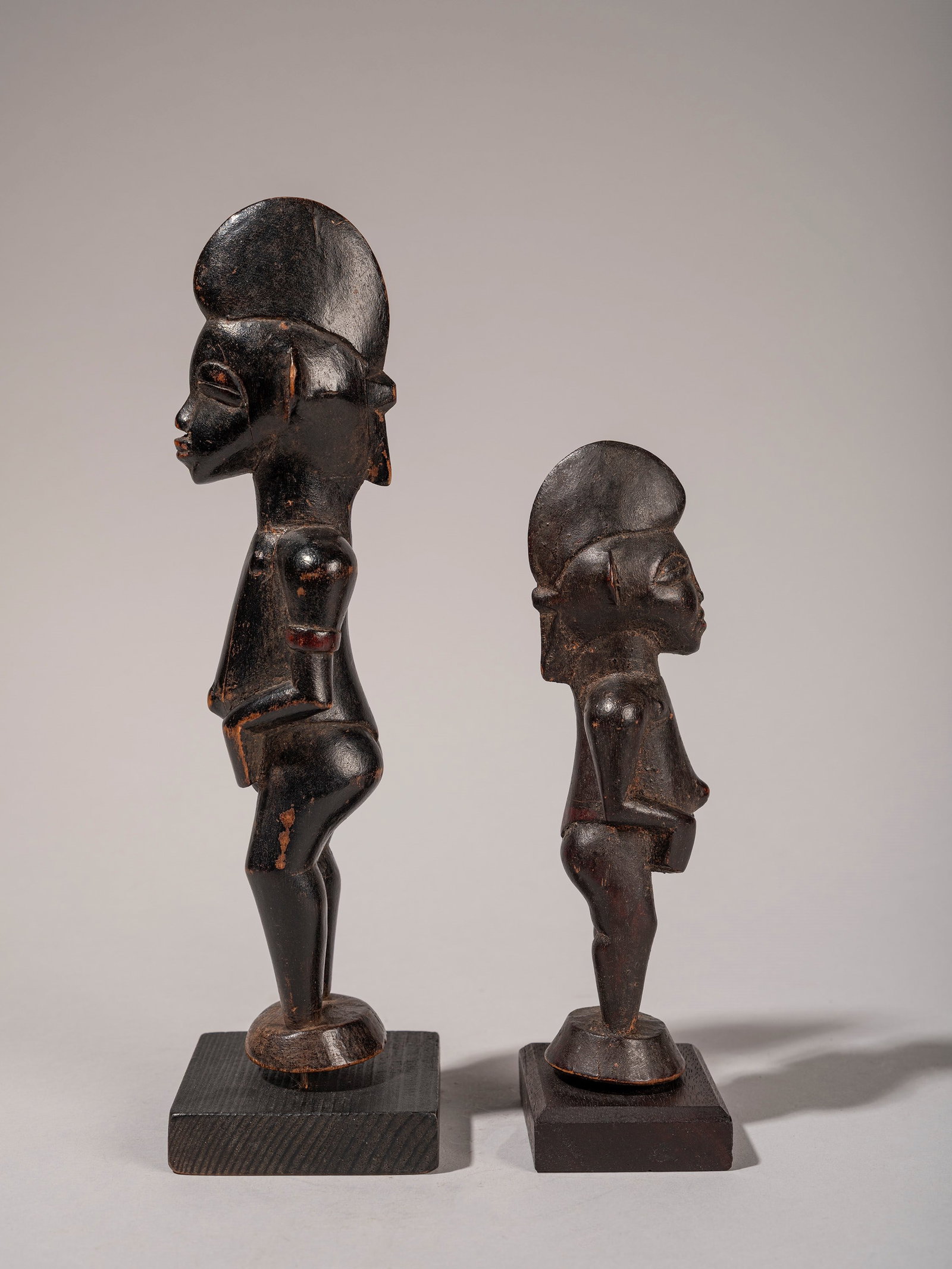 LOT COMPRISING TWO SENUFO SCULPTURES, Ivory Coast, mid-20th century: h max cm 22,5 Ivory Coast, mid-20th century