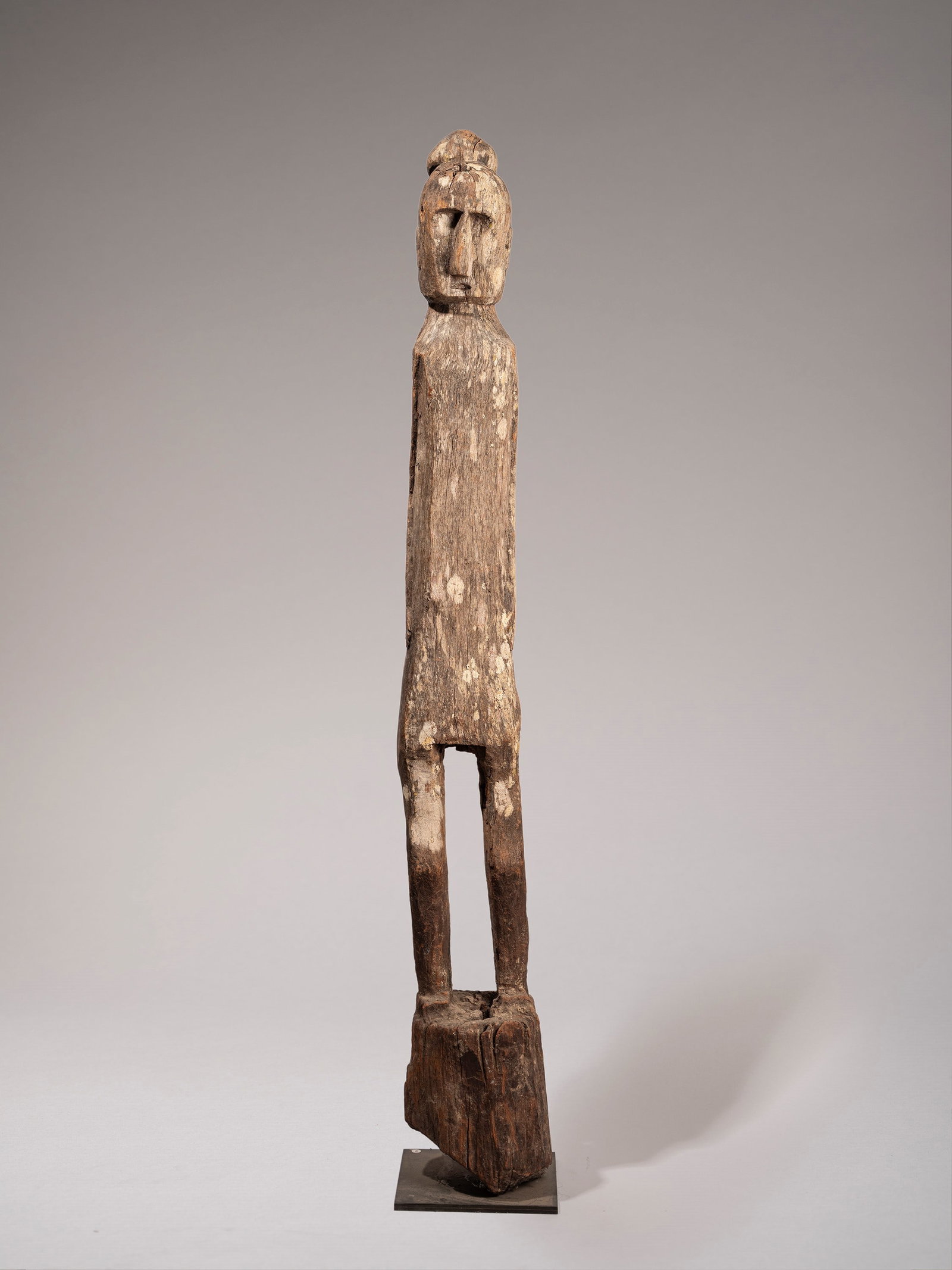 FIGURE OF THE ANCESTOR ‘ETOS’, Culture Atoni, West Timor: h cm 138 Carved in hardwood.