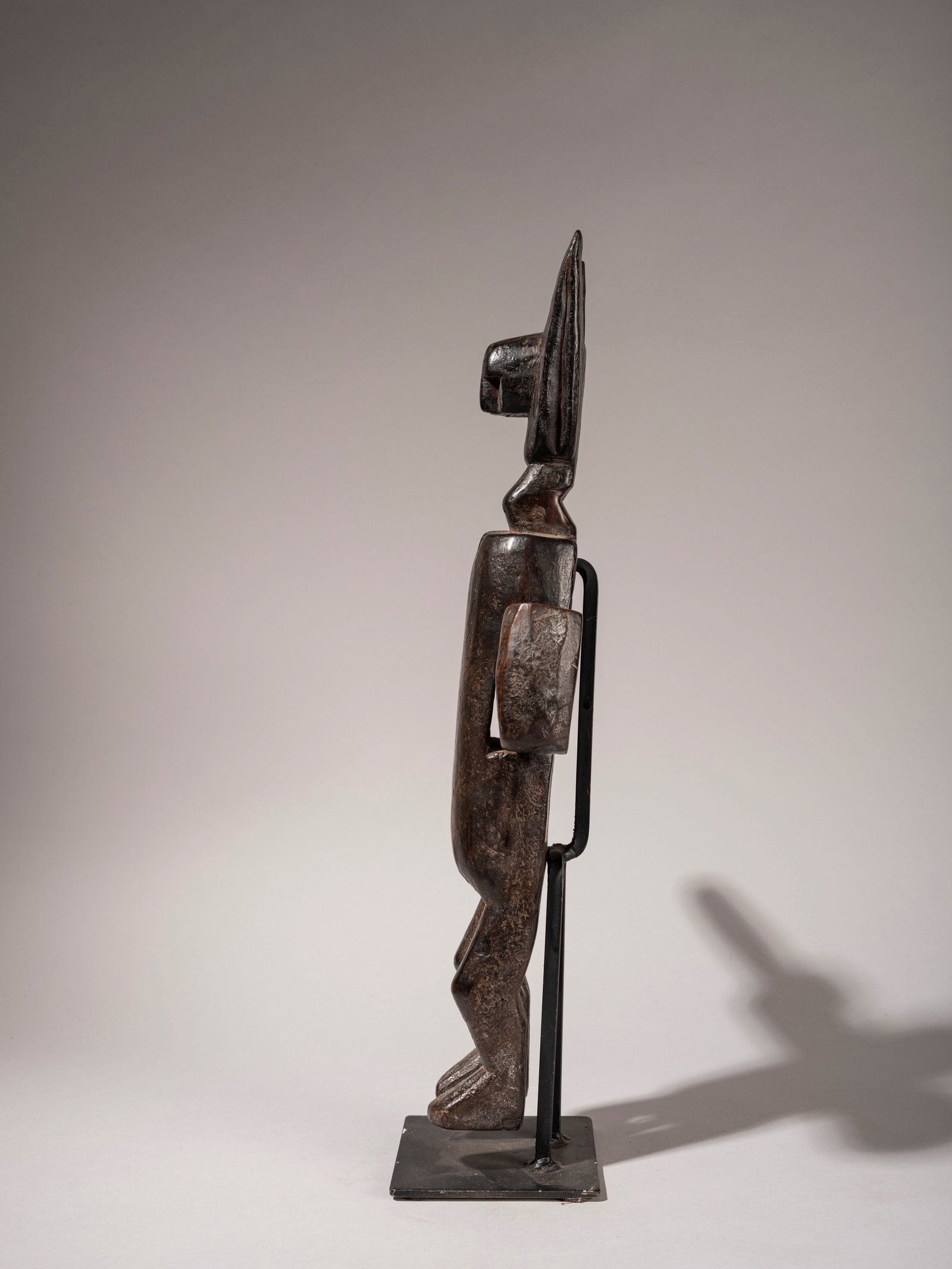 LOCK FOR A BARN DOOR, Bambara, Mali, mid-20th century: h cm 48 Featuring an anthropomorphic figure made of hardwood and metal.