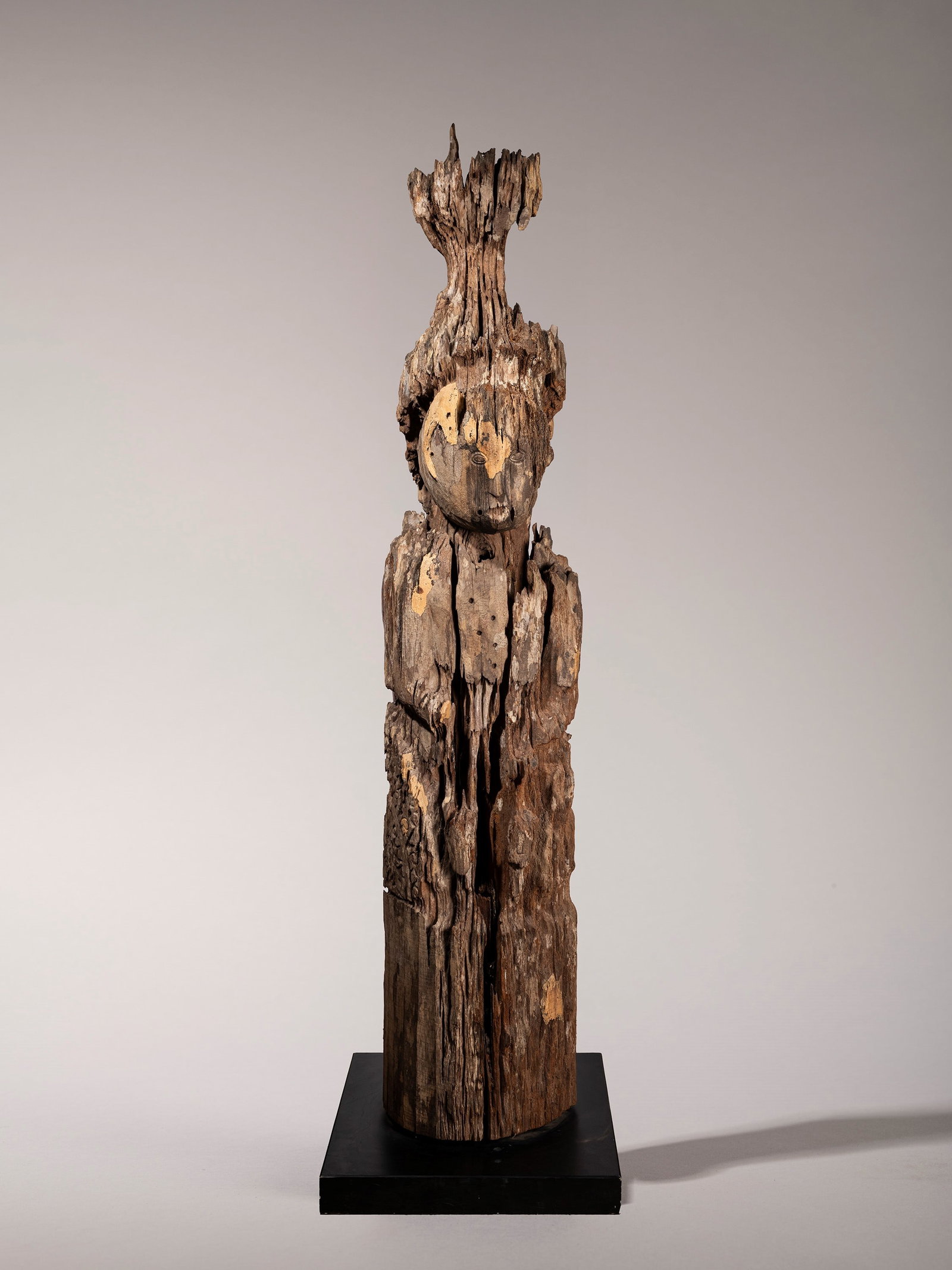 A GREAT FIGURE OF AN ANCESTRAL FIGURE, West Kalimantan: h cm 173 Carved from ironwood. Provenance: Formerly in the Angelo Attili collection, Rome
