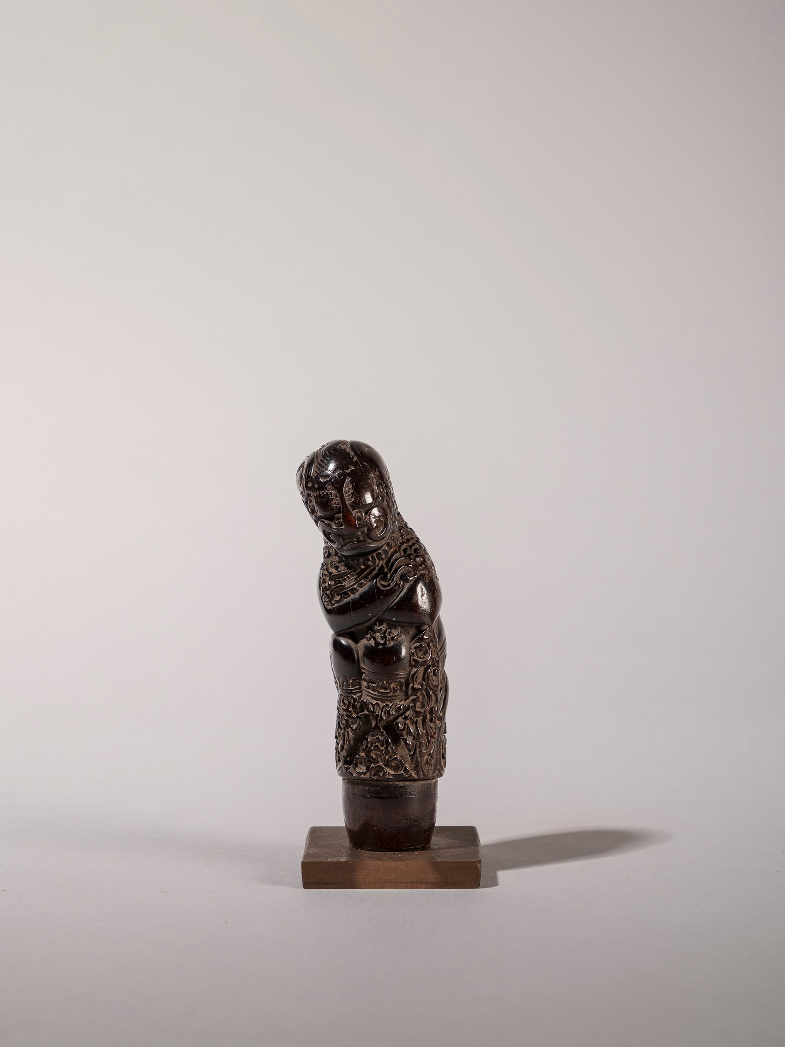 KERIS HANDLE, Java, 19th century: h cm 9 Handle depicting Raksasa.Provenance: Roberto Gamba’s collection, Milan.
