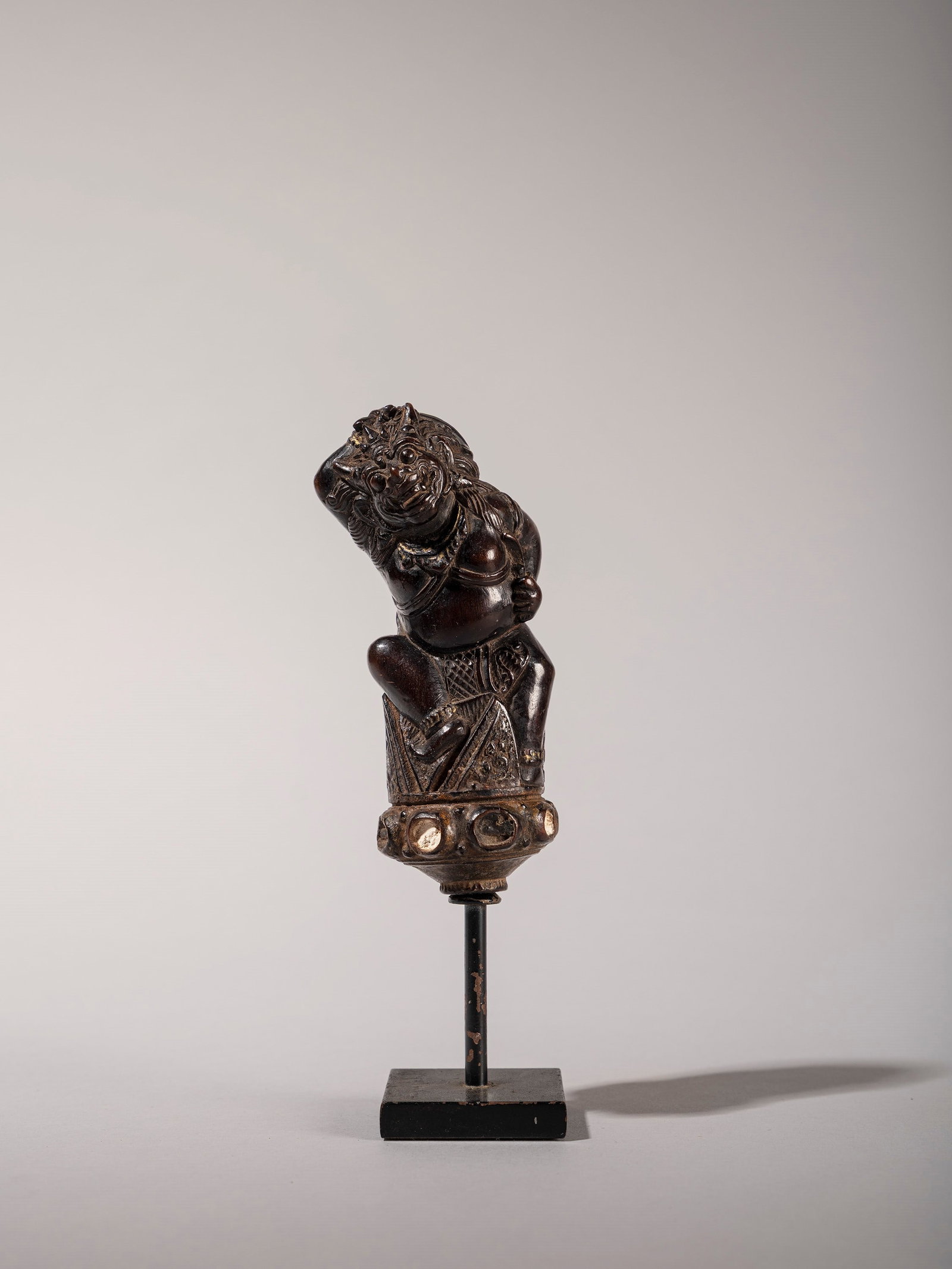 KERIS HANDLE, Bali, 19th century: h cm 11 Demonic figure.Provenance: Roberto Gamba’s collection, Milan.