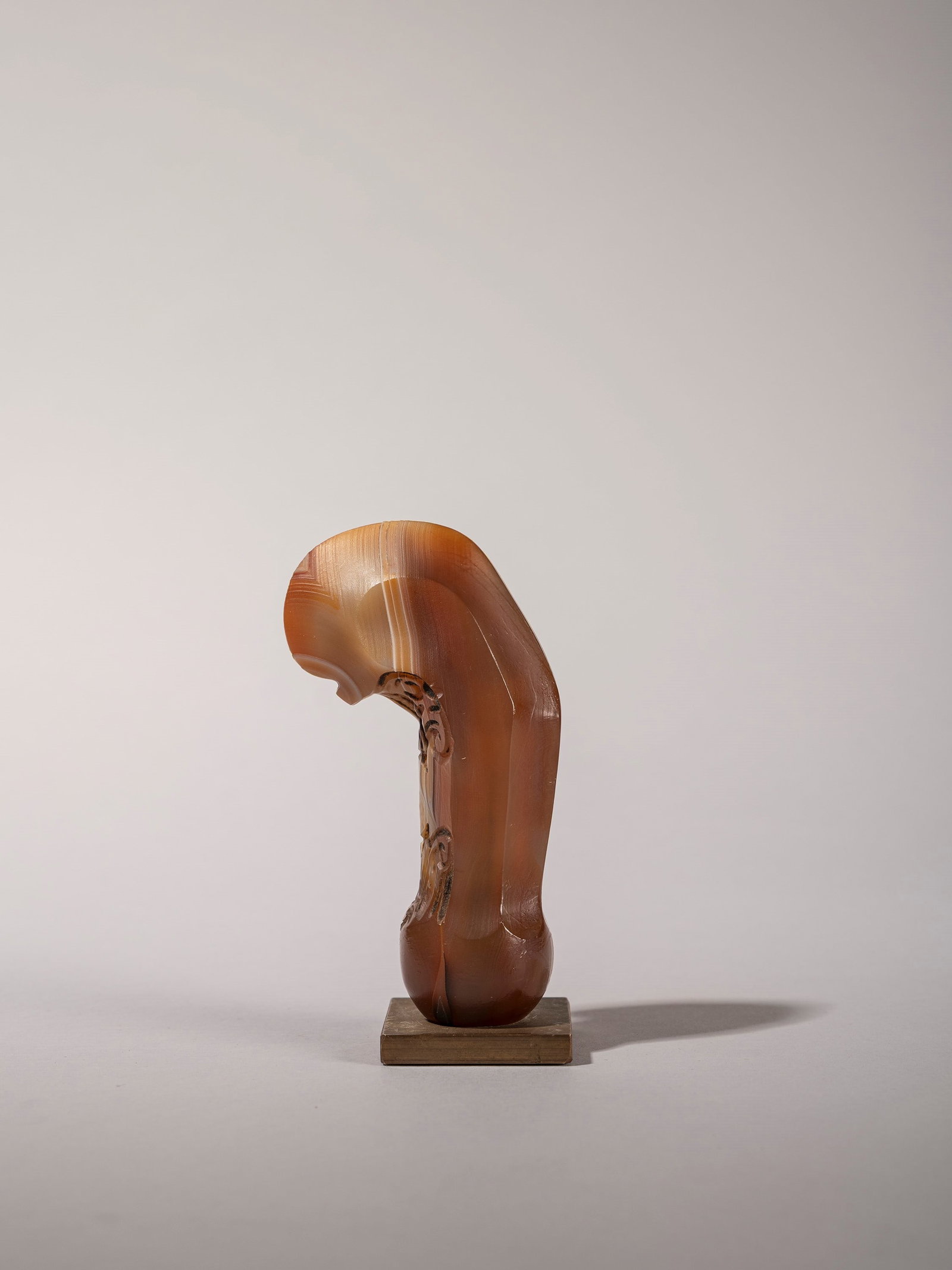 KERIS HANDLE, Early 20th century: h cm 11 Javanese handle. Made of agate.Provenance: Roberto Gamba’s collection, Milan.