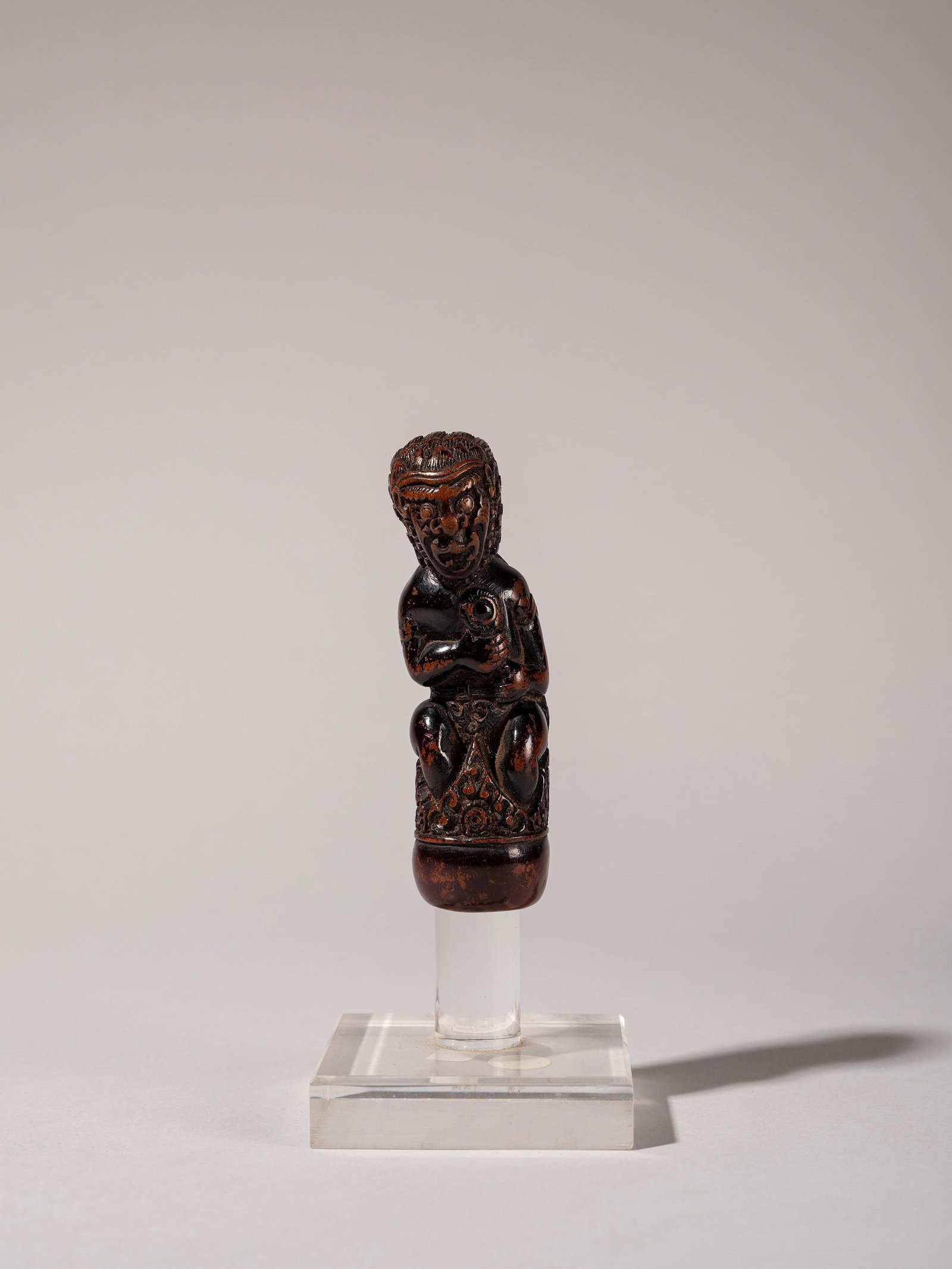 KERIS HANDLE, Java, early 20th century: h cm 10 Handle depicting a Raksasa. Polychrome decoration.Provenance: Roberto Gamba’s collection, Milan.