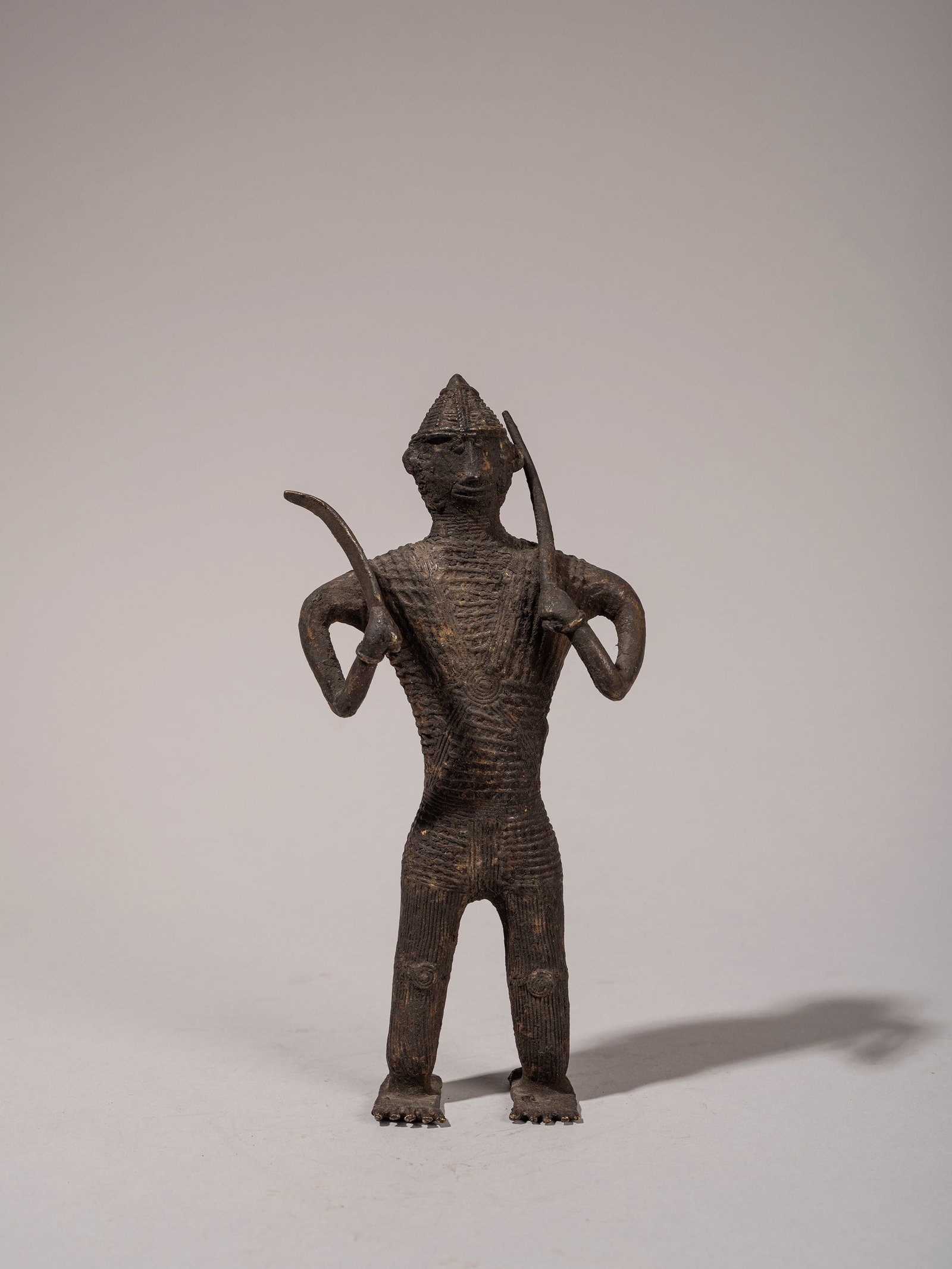 A BRONZE FIGURE DEPICTING A WARRIOR, Kond, India, 19th/20th century (1 of 3)