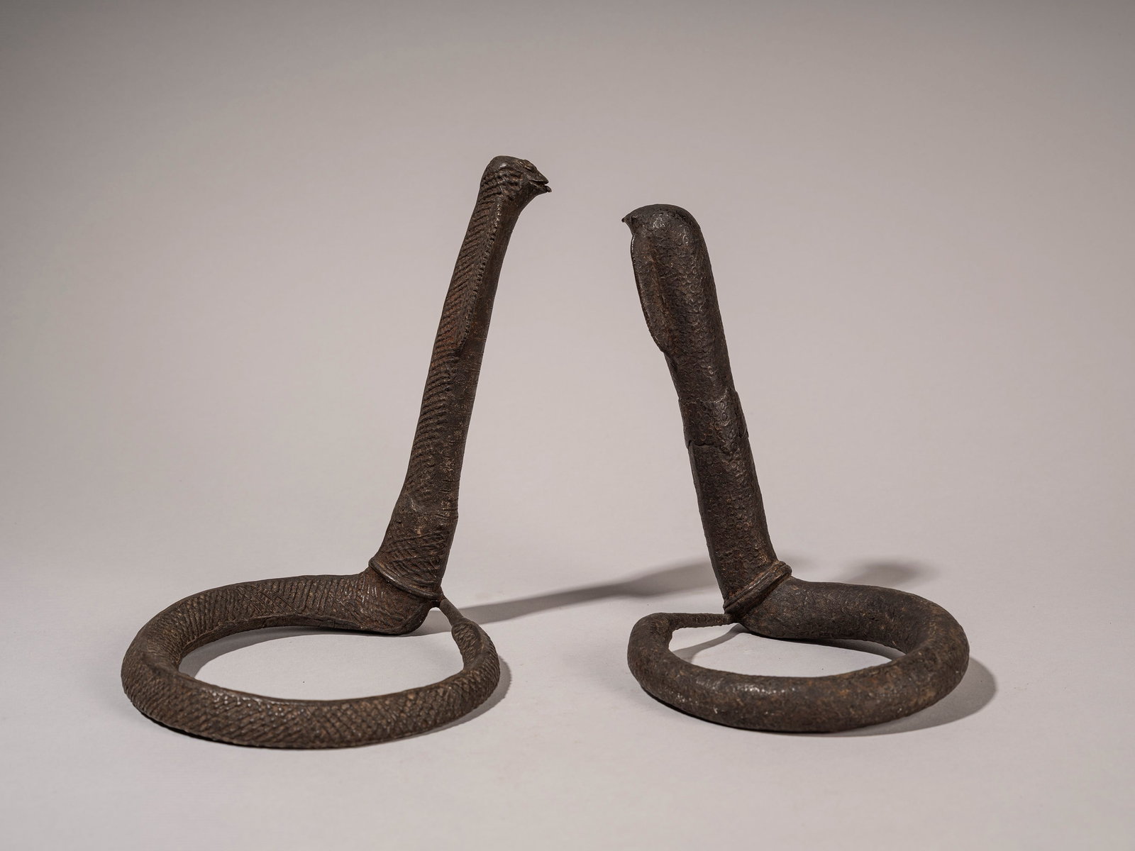 A LOT OF TWO BRONZE KOND COBRAS, India, 19th/20th century (1 of 3)