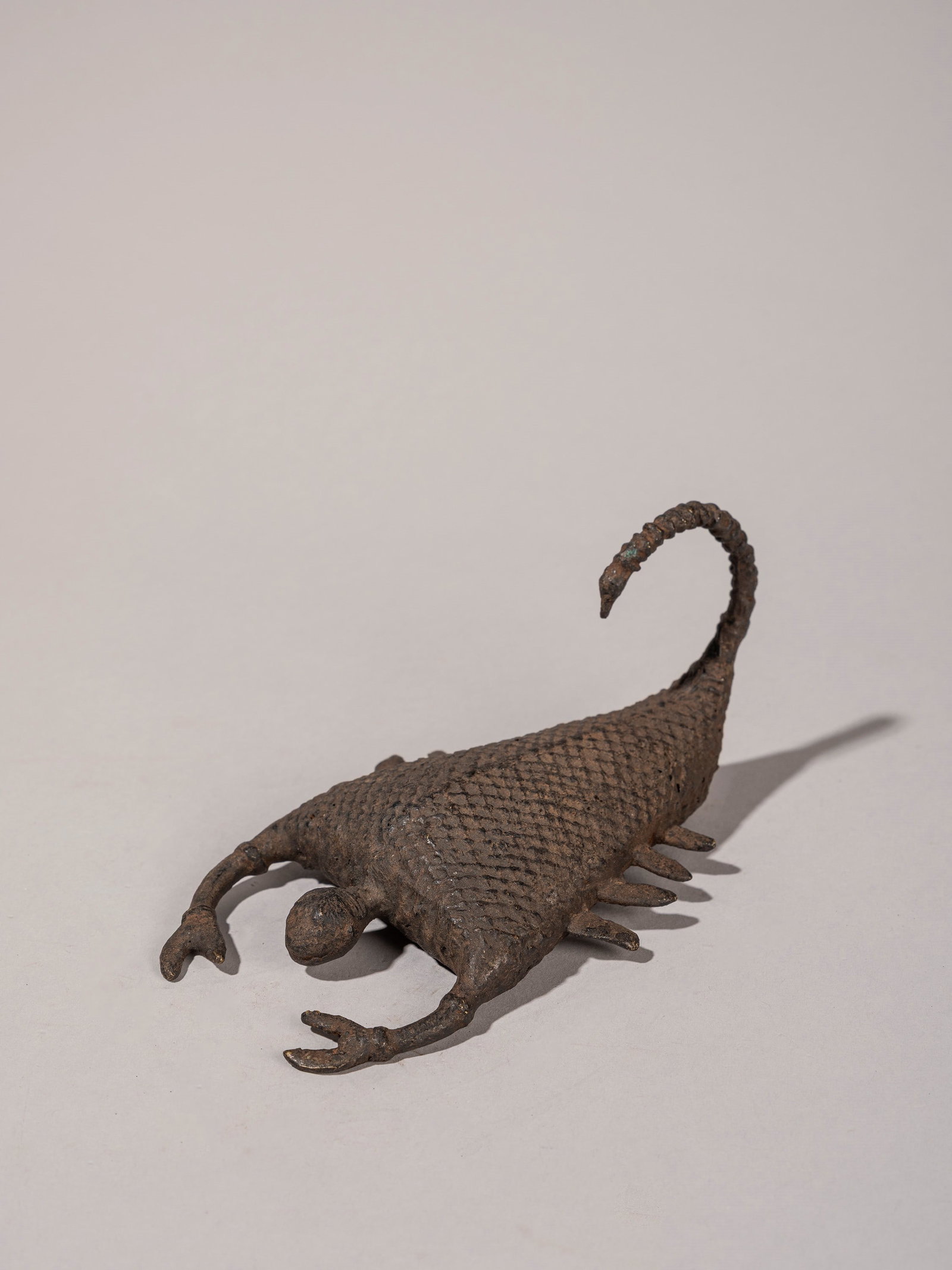A BRONZE SCULPTURE DEPICTING A KOND SCORPION, Kond, India, 19th/20th century (1 of 3)