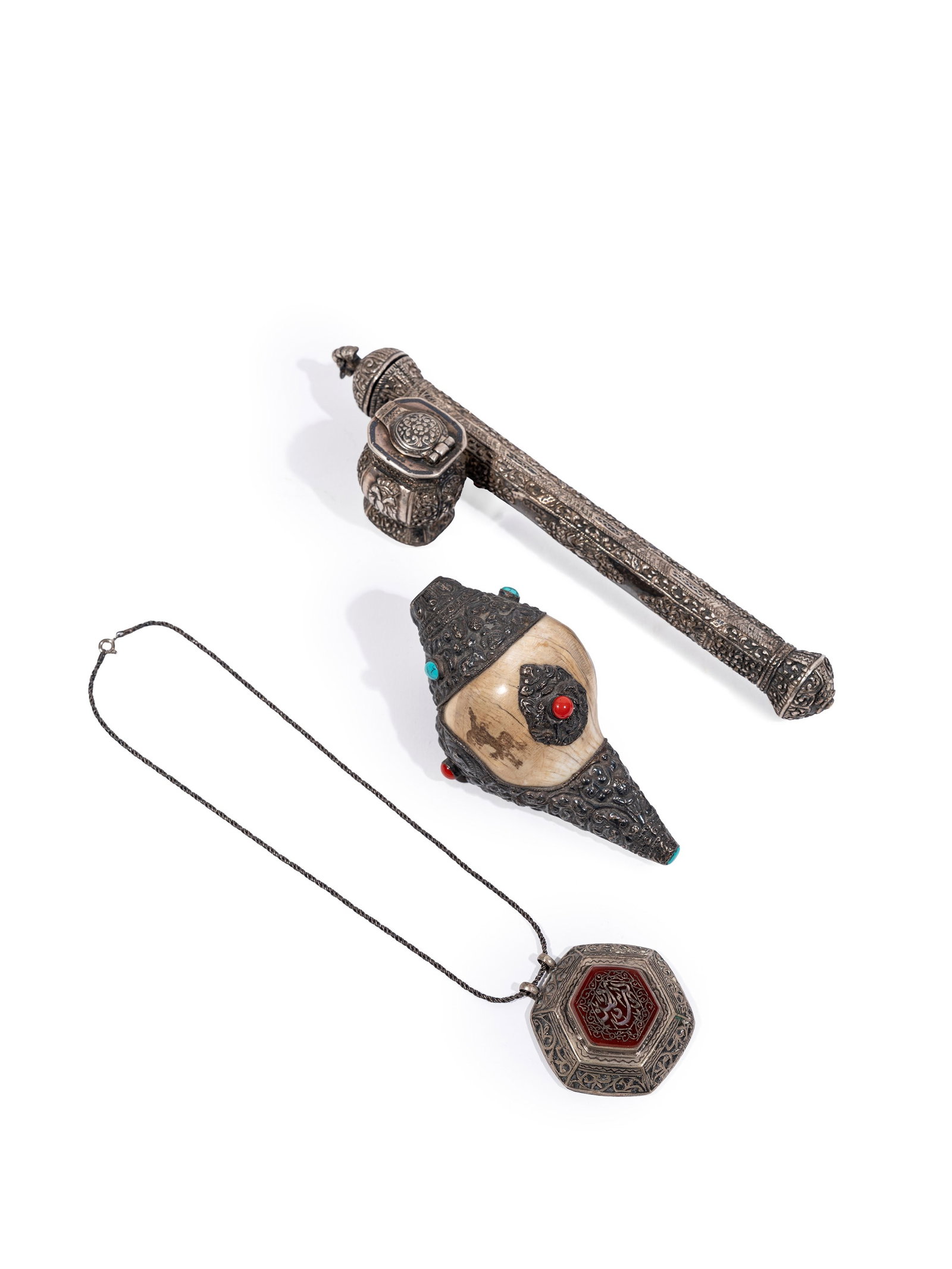 °AN INK HOLDER, AN AMULET AND A SHELL, Late 19th / early 20th century (1 of 2)