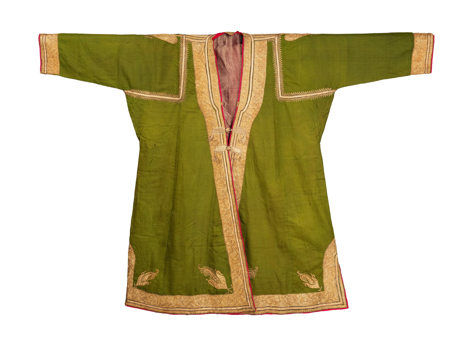 A NOBLE CHOGA IN PASHMINA WOOL EMBROIDERED WITH GOLD THREAD, India, Anglo-Indian Empire: h cm 126 x l cm 172 In green pashmina wool woven in twill and profusely hand-embroidered with twisted gold thread and lined in silk.