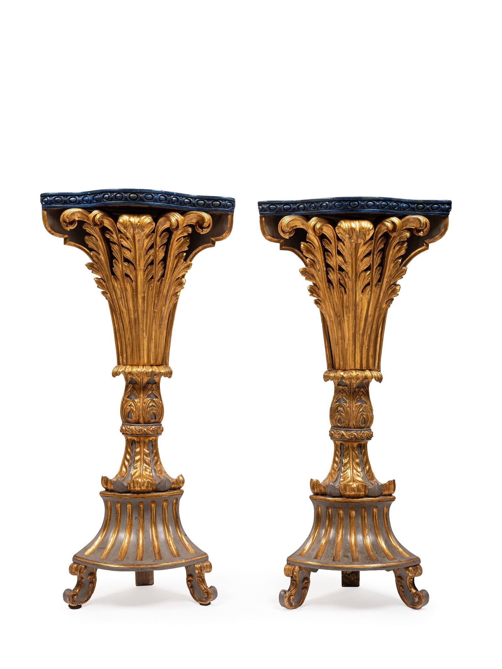 PAIR OF CARVED AND GILTWOOD CONSOLES, early 19th century: h cm 101 x l cm 48 Decoration with scrollwork and panels in wood lacquered to imitate lapis.