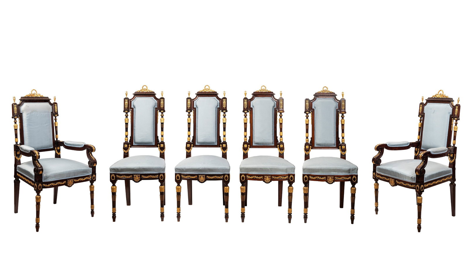 A LOT COMPRISING FOUR NAPOLEON III CHAIRS AND TWO ARMCHAIRS, 19th century: Armchair: h cm 112 × l cm 60 cm × d cm 53; chair: h cm 105 cm × l cm 44 cm × w cm 40 Made of wood and gilt bronze mounts; back and seat in blue fabric; decorated with friezes, garlands and vases i