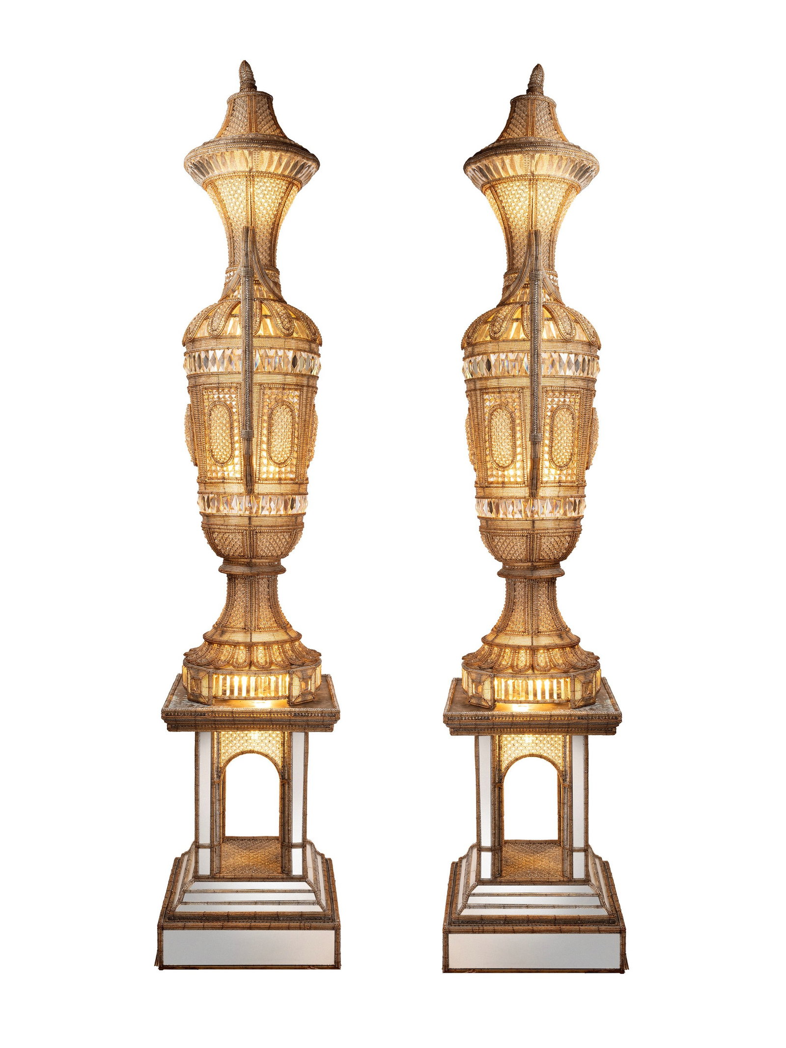 PAIR OF MONUMENTAL CUT-GLASS VASE LAMPS, 20th century: h cm 242 x l cm 47 x w cm 47 Of amphora form, they are richly decorated with elegant applications of micro-beads and glass prisms. Each vase is fitted with slender twin scroll handles and surmounted b