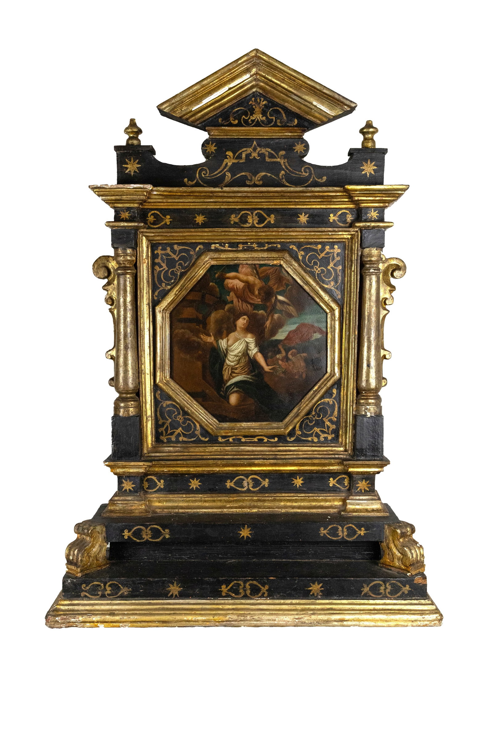 °ALTARPIECE WITH PAINTING DEPICTING THE MARTYRDOM OF SAINT CATHERINE OF ALEXANDRIA, Italian School,: Oil on panel h cm 105 x l cm 62 x p cm 20; the painting h cm 32 x l cm 32 Octagonal painting; small altarpiece in carved, lacquered and gilded wood, with broken pediment, two side columns and bracket 