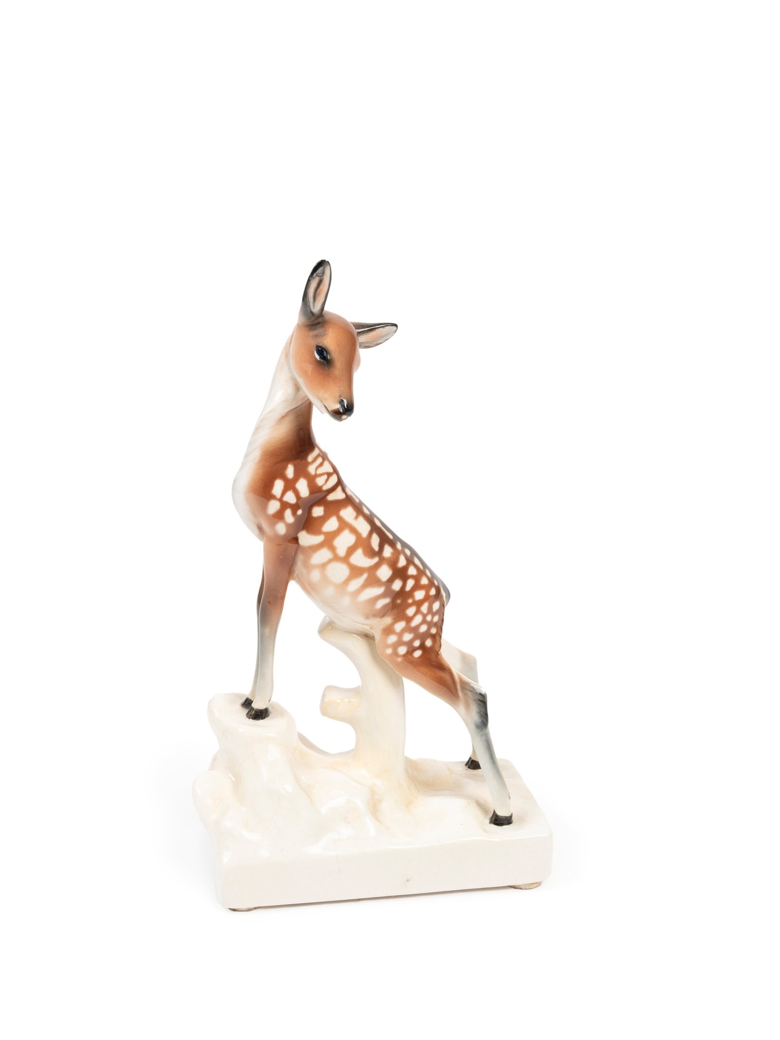Lenci POLYCHROME EARTHENWARE SCULPTURE DEPICTING A FAWN, Turin, circa 1940: h cm 25,5 Model by Felice Tosalli. Signed under the base 'Lenci Made in Italy'.