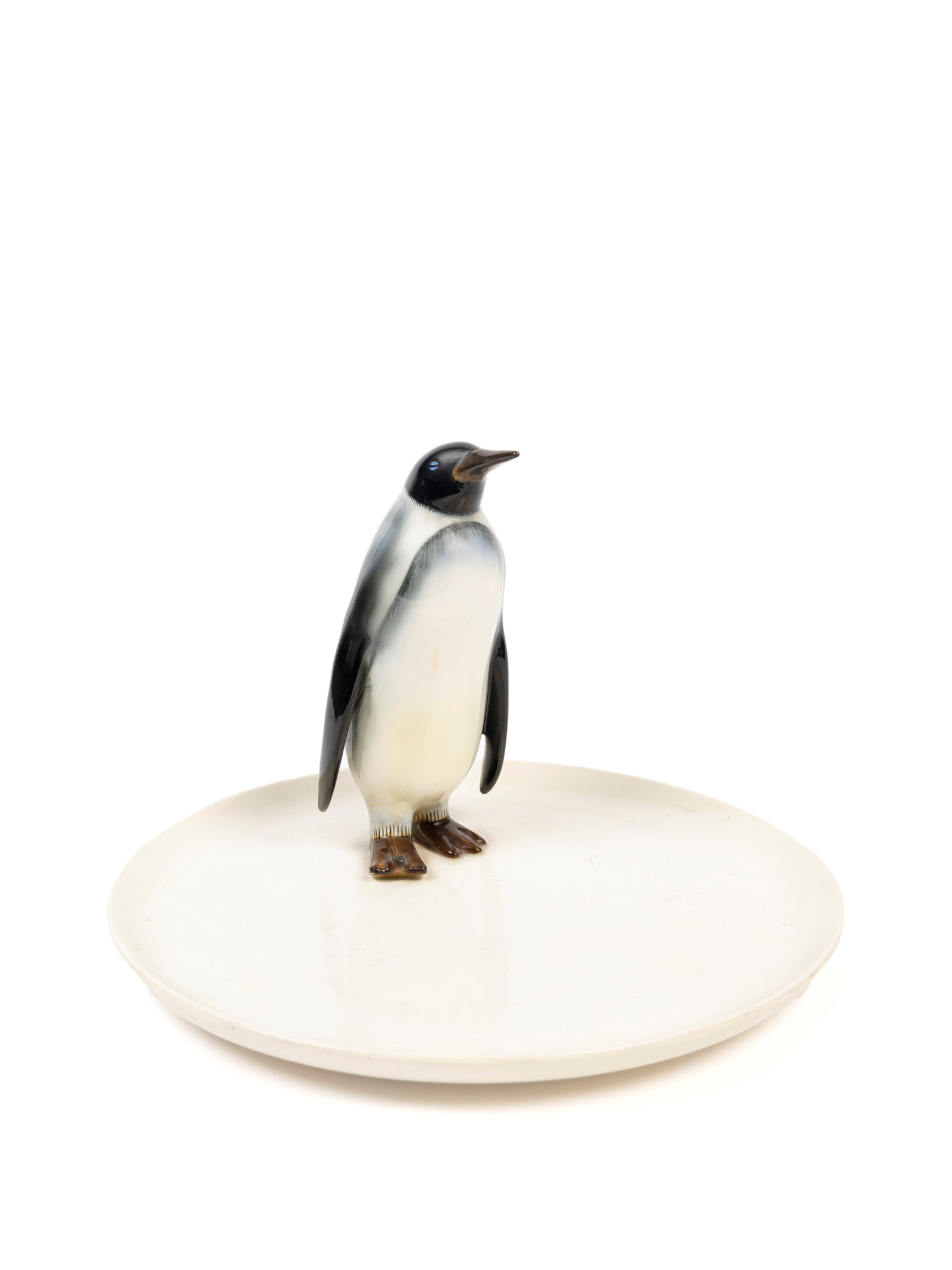 Lenci POLYCHROME EARTHENWARE CENTERPIECE WITH PENGUIN, Turin, 1935: h cm 21 x d cm 31 Model by Mario Sturani. Signed under the base 'Lenci Made in Italy Torino 9–XIII'.