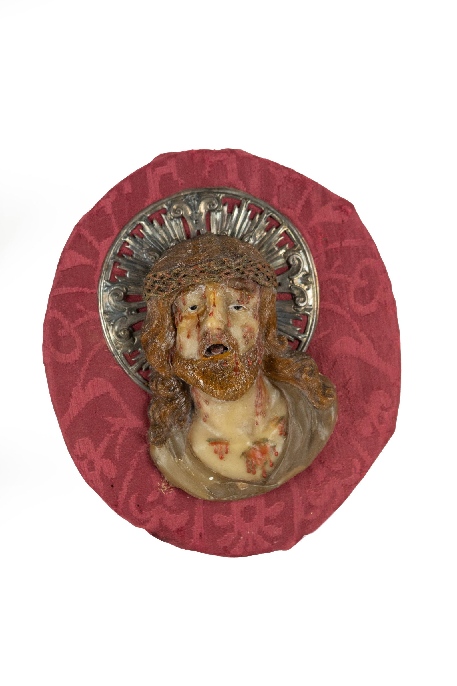 °A WAX MODEL DEPICTING THE HEAD OF THE FLAGELLATED CHRIST WITH A SILVER HALO, 18th/19th centuries (1 of 1)