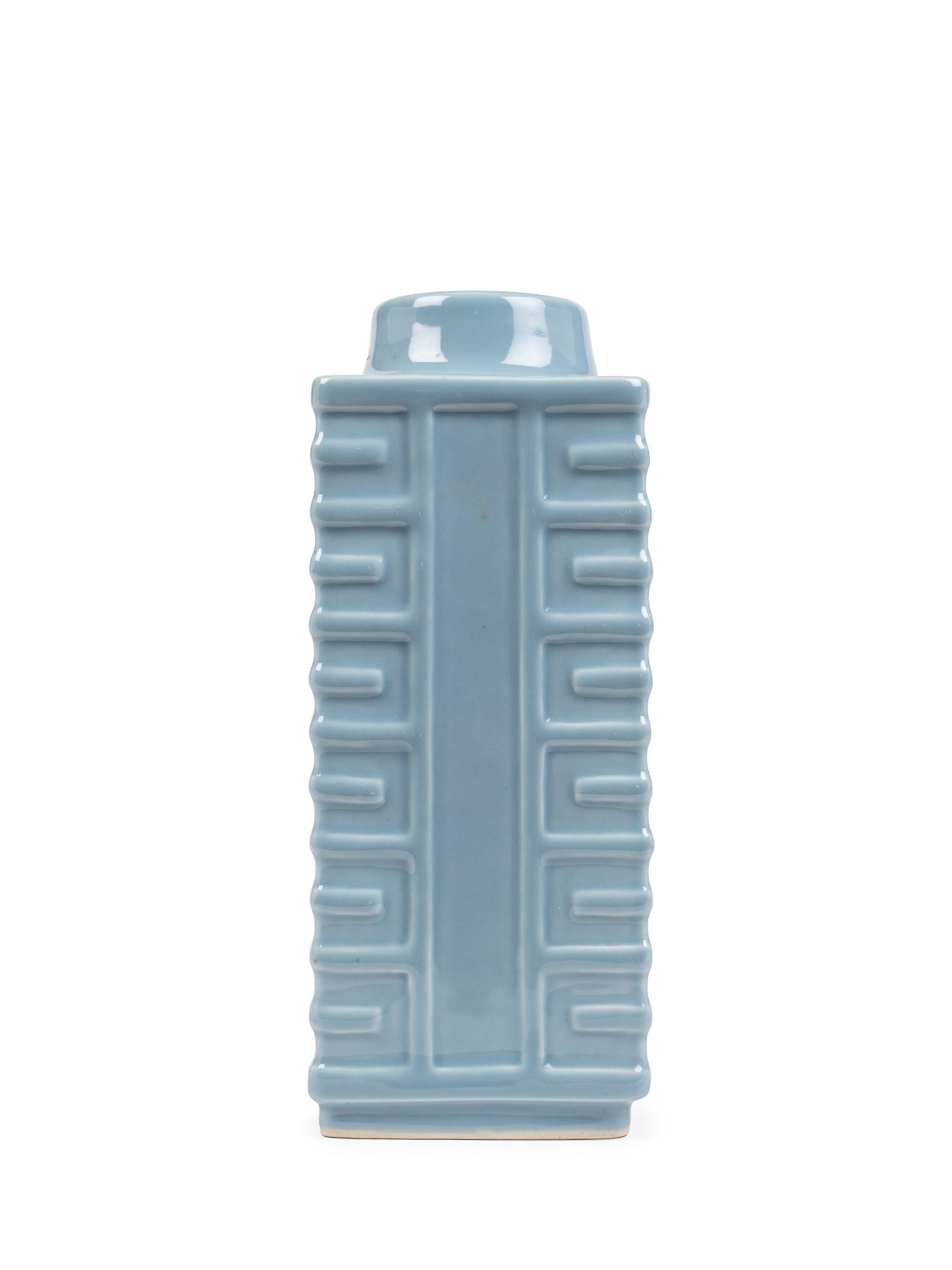 A CLAIR-DE-LUNE PORCELAIN VASE, China, 20th century: h cm 31,5 Modelled in imitation of a Neolithic jade cong, the square section with four rectangular sides, each moulded with alternating long and short horizontal ribs along the outer edges, leaving th