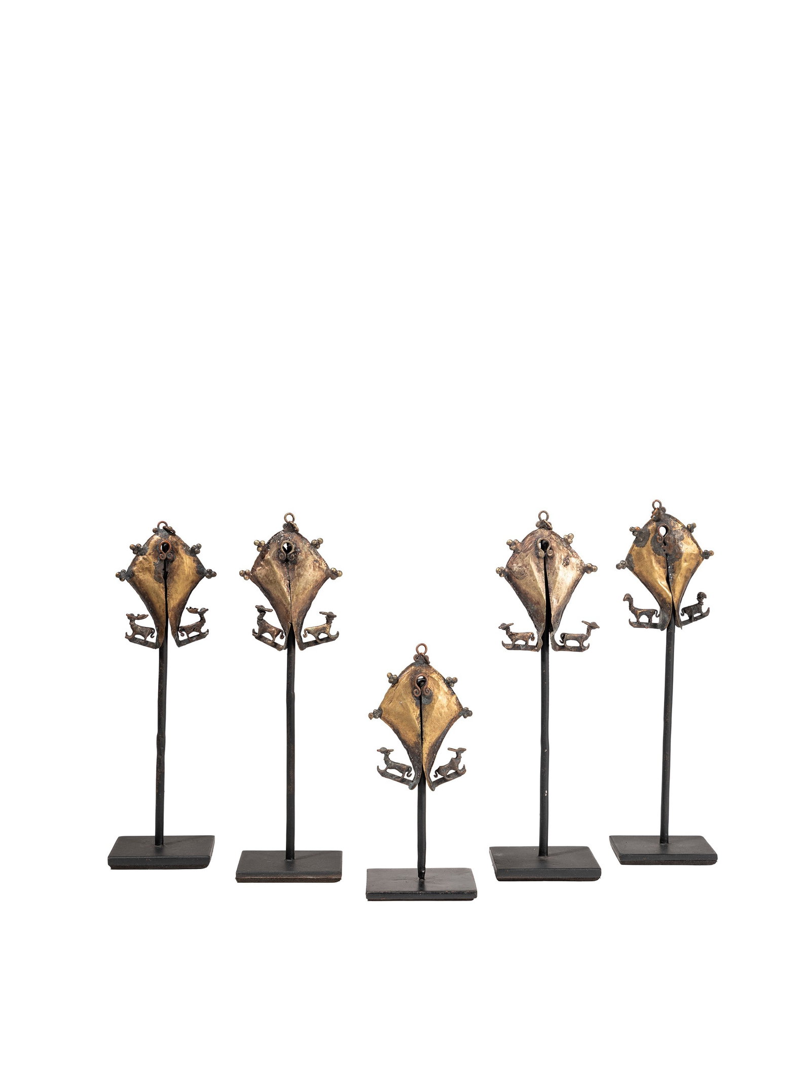 °A GROUP OF FIVE CEREMONIAL PENDANTS (MAMULI), Sumba Island, Eastern Indonesia. (1 of 2)