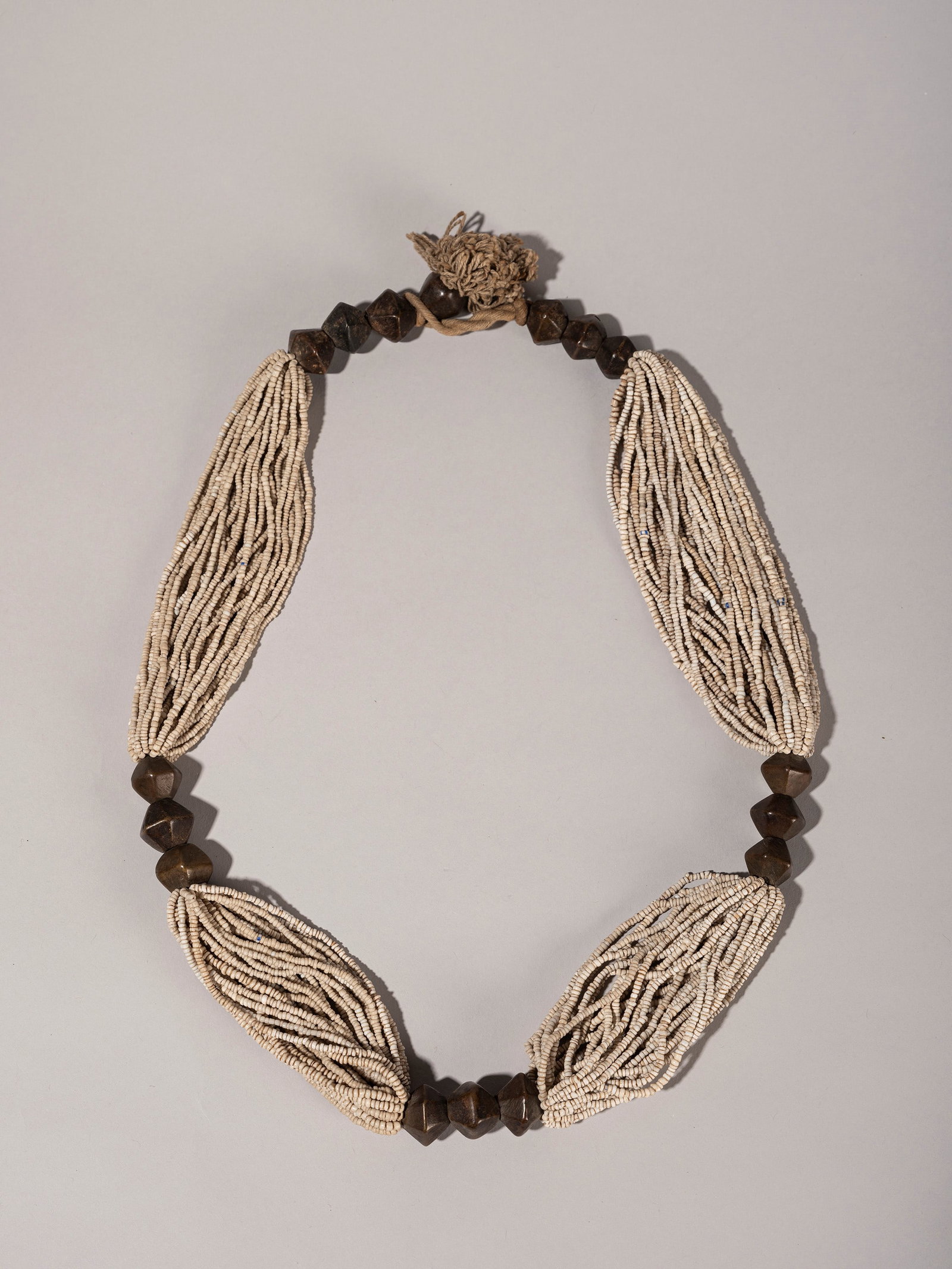 TRIBAL NECKLACE, India, mid-20th century.: d cm 26 In brass beads and glass paste.
