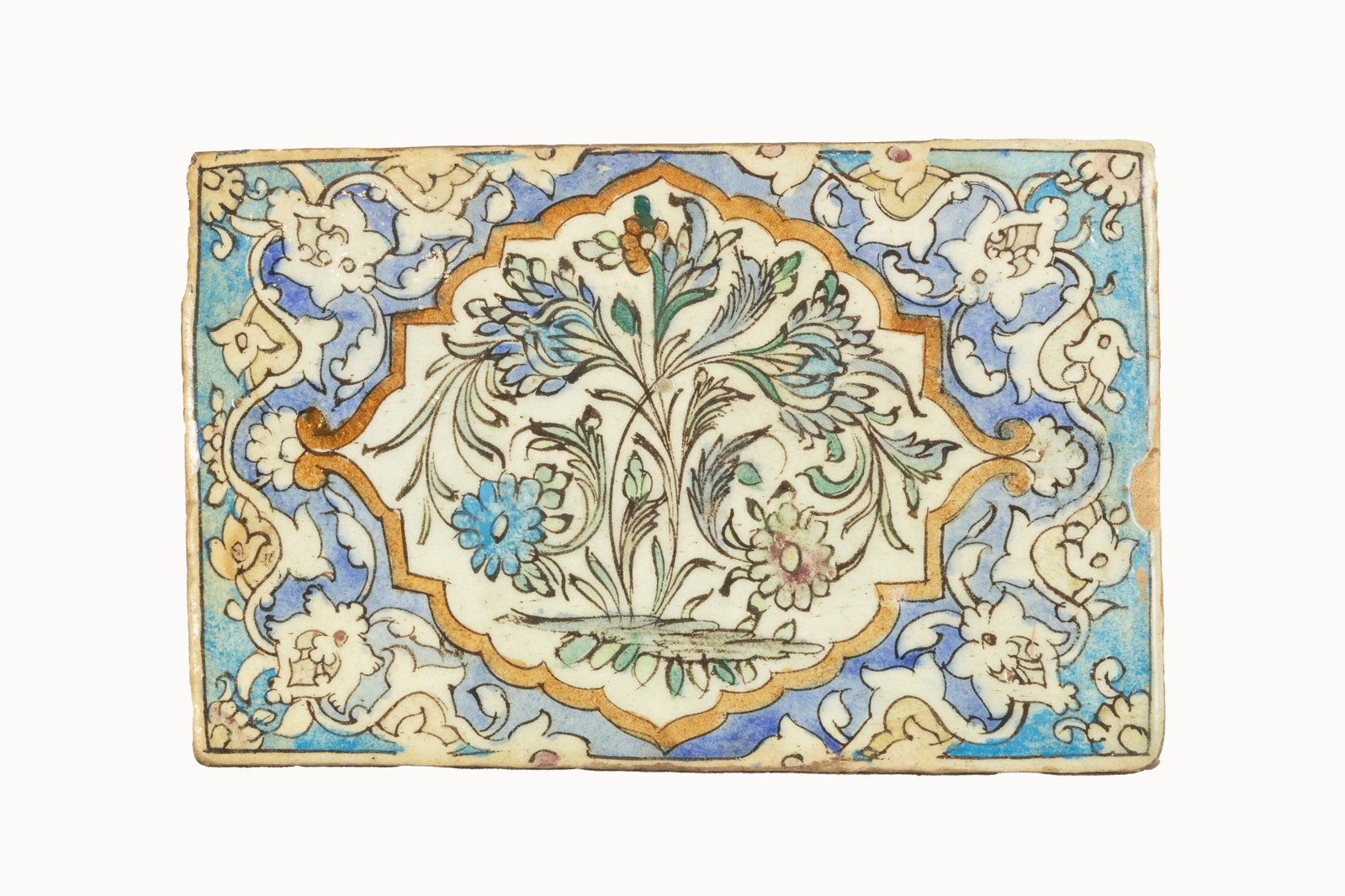 °A GLAZED TERRACOTTA PLATE, Persia, 19th century: h cm 24,3 x l cm 37,7 x p cm 2 Decorated with floral motifs.
