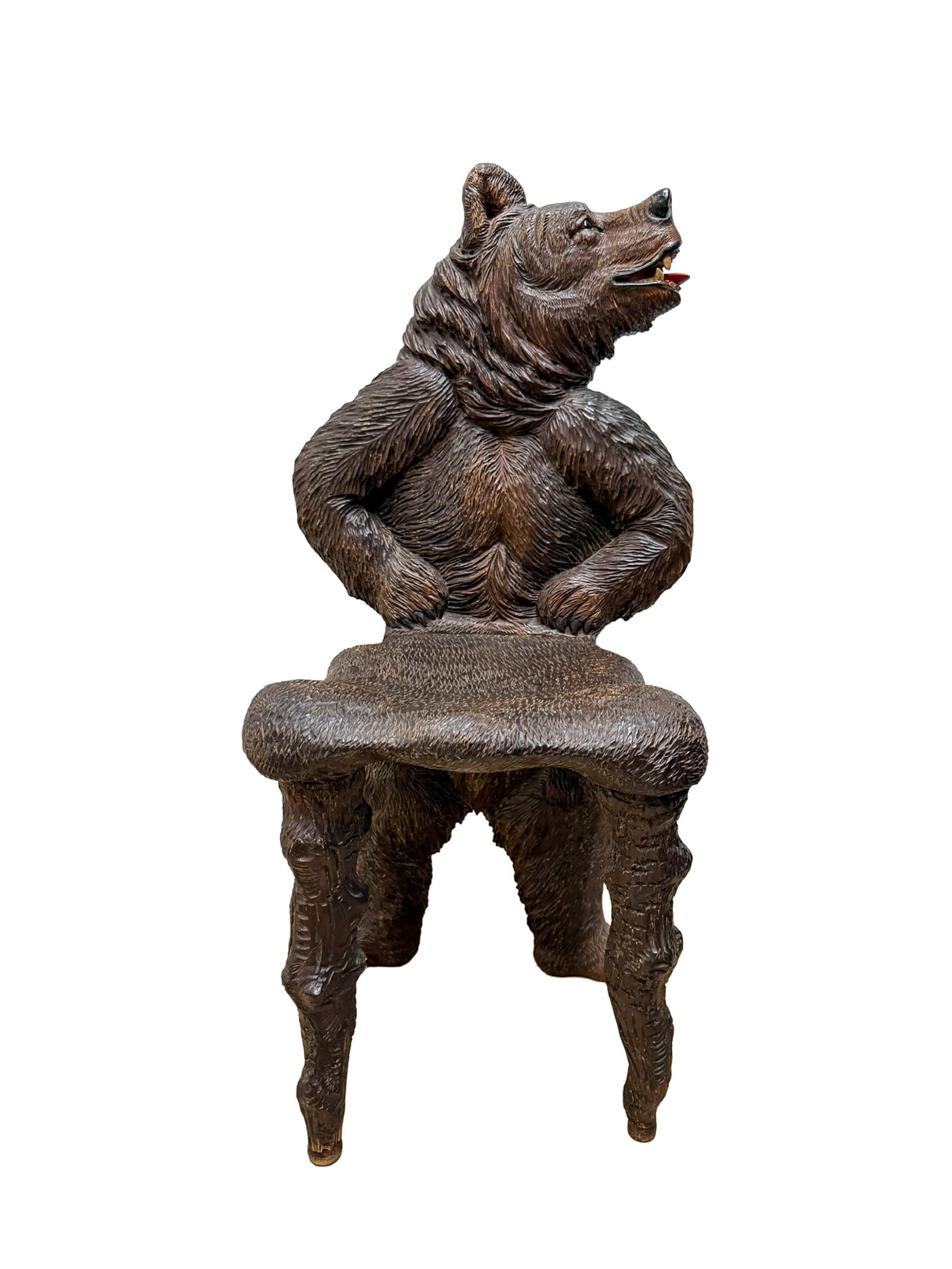 °BLACK FOREST HALL CHAIR, Late 19th / early 20th century: h cm 77 x l cm 38 x p cm 31,5 The backrest consists of a standing brown bear figure. The seat features a refined decoration imitating natural bark, with legs carved in imitation of tree branches.