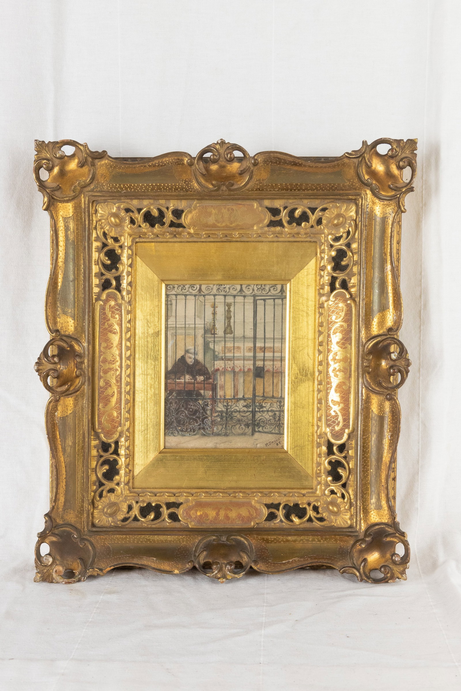 °CHURCH INTERIOR WITH A FRIAR, 19th century: Watercolour on paper. h cm 16,5 x l cm 12; con cornice h cm 39,5 x l cm 33,5 Within a gilt frame. Bearing the signature “P. Joris 87” lower right.