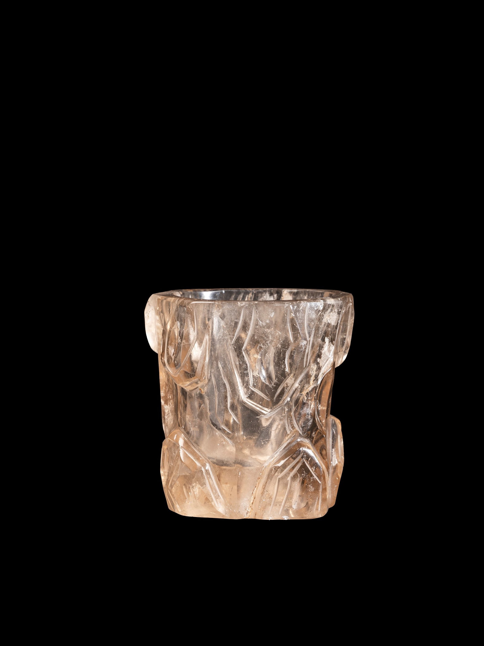 A FUMÉ ROCK-CRYSTAL TREE-TRUNK-SHAPED BRUSPOT, BITONG, China, Qing dynasty, 18th/19th century: h cm 10Finely carved in the form of a pine trunk.Catalogue notes:See a similar brush holder sold at Bonhams, The Marsh Collection – Art for the Literati, 3 November 2022, London, New Bond Street